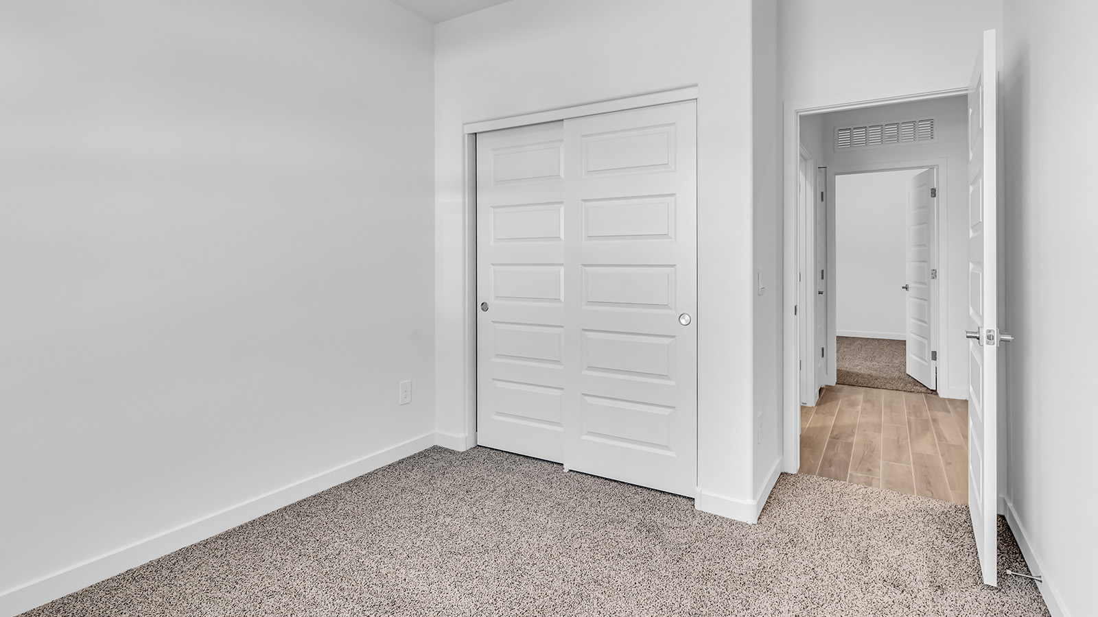 Discover The Harris, a beautifully designed new home at The Oasis at Rocking K, located in the serene surroundings of Vail, Arizona.  This charming one-story new home offers a seamless blend of style, functionality, and comfort, perfect for families and individuals alike. The Harris spans 1,856 square feet and includes four spacious bedrooms, two-and-a-half bathrooms, and a two-car garage, all meticulously crafted to meet the needs of modern living.  The exterior of The Harris offers three elevation options, each featuring D.R. Horton’s signature Spanish lace stucco, tile roofs, and professionally landscaped front yards with auto drip irrigation, adding to the home’s curb appeal. Inside, you’re greeted by an inviting foyer that leads to an open-concept living area, where the great room flows effortlessly into the dining area and a modern kitchen.  The kitchen is a chef's dream, equipped with top-of-the-line stainless steel appliances, quartz countertops, a large center island, and 42” shaker-style cabinets with stylish cabinet pulls. Adjacent to the kitchen, the dining area is perfect for family meals or entertaining guests. The great room, with its ample natural light and direct access to the covered patio, provides a perfect space for relaxation and gatherings.  The primary bedroom is a private sanctuary located at the back of the home, offering tranquility and easy access to the backyard. It features a walk-in closet and a luxurious en-suite bathroom with dual sinks and a large walk-in shower. The additional three bedrooms are generously sized, with two sharing a well-appointed full bathroom. A powder room, strategically placed near the living areas, adds convenience for guests.  Living at The Oasis at Rocking K means enjoying a variety of amenities, including ramadas, picnic areas, and access to the greater Rocking K master-planned community’s parks, walking trails, recreational facilities and events. Each home in this community also comes equipped with D.R. Horton’s Home is Connected® Smart Home package, offering the latest in modern living with features like a smart thermostat, video doorbell, and more.  Whether you’re looking for a home that offers space, style, or a sense of community, The Harris at The Oasis at Rocking K provides it all in a location that’s close to everything you need in Vail, Arizona.