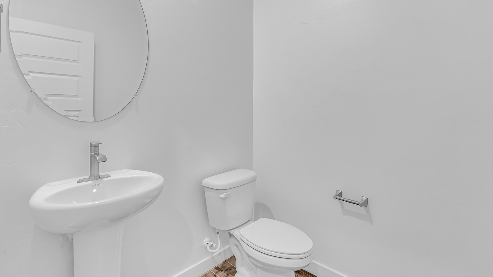 Discover The Harris, a beautifully designed new home at The Oasis at Rocking K, located in the serene surroundings of Vail, Arizona.  This charming one-story new home offers a seamless blend of style, functionality, and comfort, perfect for families and individuals alike. The Harris spans 1,856 square feet and includes four spacious bedrooms, two-and-a-half bathrooms, and a two-car garage, all meticulously crafted to meet the needs of modern living.  The exterior of The Harris offers three elevation options, each featuring D.R. Horton’s signature Spanish lace stucco, tile roofs, and professionally landscaped front yards with auto drip irrigation, adding to the home’s curb appeal. Inside, you’re greeted by an inviting foyer that leads to an open-concept living area, where the great room flows effortlessly into the dining area and a modern kitchen.  The kitchen is a chef's dream, equipped with top-of-the-line stainless steel appliances, quartz countertops, a large center island, and 42” shaker-style cabinets with stylish cabinet pulls. Adjacent to the kitchen, the dining area is perfect for family meals or entertaining guests. The great room, with its ample natural light and direct access to the covered patio, provides a perfect space for relaxation and gatherings.  The primary bedroom is a private sanctuary located at the back of the home, offering tranquility and easy access to the backyard. It features a walk-in closet and a luxurious en-suite bathroom with dual sinks and a large walk-in shower. The additional three bedrooms are generously sized, with two sharing a well-appointed full bathroom. A powder room, strategically placed near the living areas, adds convenience for guests.  Living at The Oasis at Rocking K means enjoying a variety of amenities, including ramadas, picnic areas, and access to the greater Rocking K master-planned community’s parks, walking trails, recreational facilities and events. Each home in this community also comes equipped with D.R. Horton’s Home is Connected® Smart Home package, offering the latest in modern living with features like a smart thermostat, video doorbell, and more.  Whether you’re looking for a home that offers space, style, or a sense of community, The Harris at The Oasis at Rocking K provides it all in a location that’s close to everything you need in Vail, Arizona.