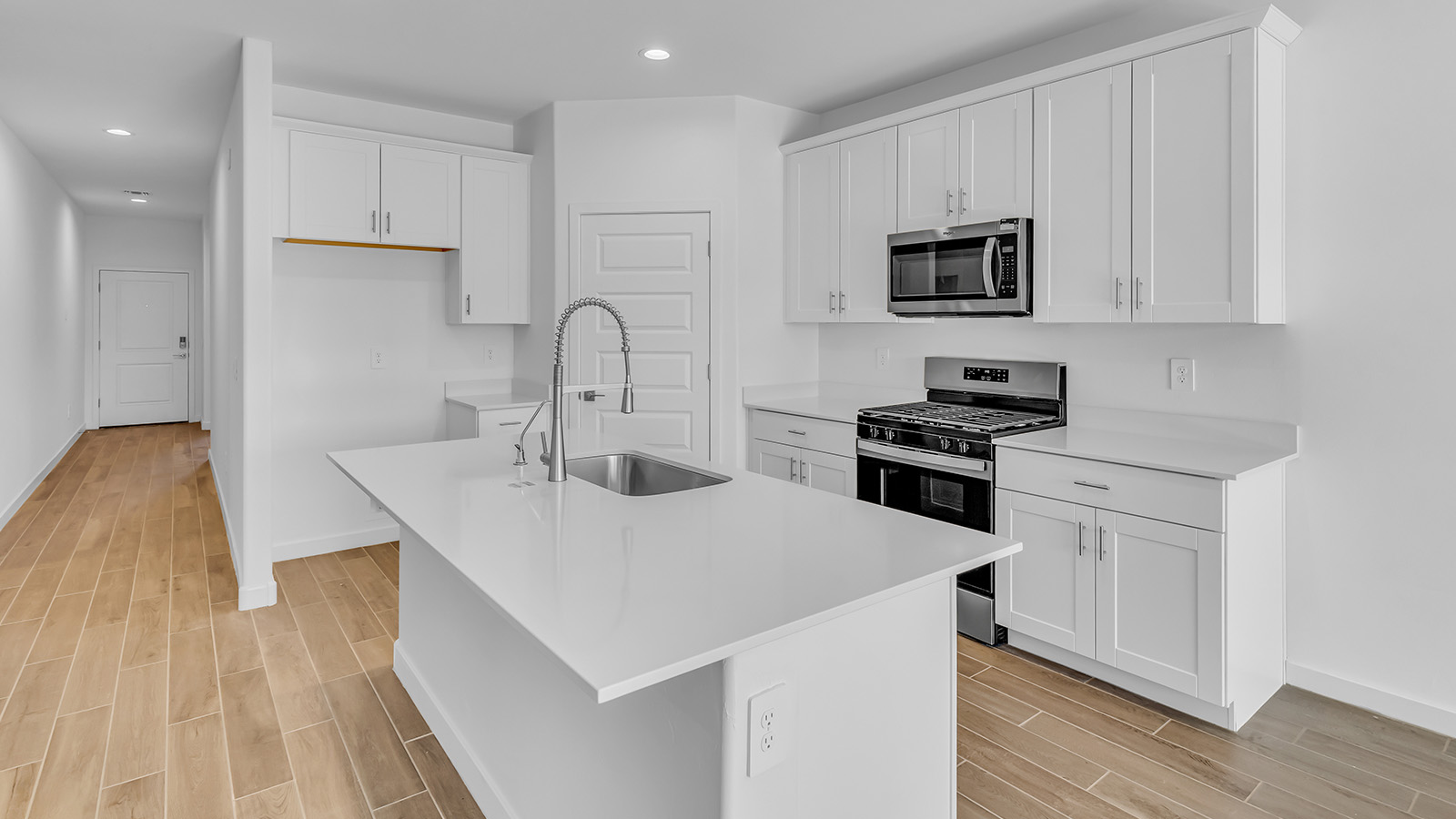 Discover The Harris, a beautifully designed new home at The Oasis at Rocking K, located in the serene surroundings of Vail, Arizona.  This charming one-story new home offers a seamless blend of style, functionality, and comfort, perfect for families and individuals alike. The Harris spans 1,856 square feet and includes four spacious bedrooms, two-and-a-half bathrooms, and a two-car garage, all meticulously crafted to meet the needs of modern living.  The exterior of The Harris offers three elevation options, each featuring D.R. Horton’s signature Spanish lace stucco, tile roofs, and professionally landscaped front yards with auto drip irrigation, adding to the home’s curb appeal. Inside, you’re greeted by an inviting foyer that leads to an open-concept living area, where the great room flows effortlessly into the dining area and a modern kitchen.  The kitchen is a chef's dream, equipped with top-of-the-line stainless steel appliances, quartz countertops, a large center island, and 42” shaker-style cabinets with stylish cabinet pulls. Adjacent to the kitchen, the dining area is perfect for family meals or entertaining guests. The great room, with its ample natural light and direct access to the covered patio, provides a perfect space for relaxation and gatherings.  The primary bedroom is a private sanctuary located at the back of the home, offering tranquility and easy access to the backyard. It features a walk-in closet and a luxurious en-suite bathroom with dual sinks and a large walk-in shower. The additional three bedrooms are generously sized, with two sharing a well-appointed full bathroom. A powder room, strategically placed near the living areas, adds convenience for guests.  Living at The Oasis at Rocking K means enjoying a variety of amenities, including ramadas, picnic areas, and access to the greater Rocking K master-planned community’s parks, walking trails, recreational facilities and events. Each home in this community also comes equipped with D.R. Horton’s Home is Connected® Smart Home package, offering the latest in modern living with features like a smart thermostat, video doorbell, and more.  Whether you’re looking for a home that offers space, style, or a sense of community, The Harris at The Oasis at Rocking K provides it all in a location that’s close to everything you need in Vail, Arizona.