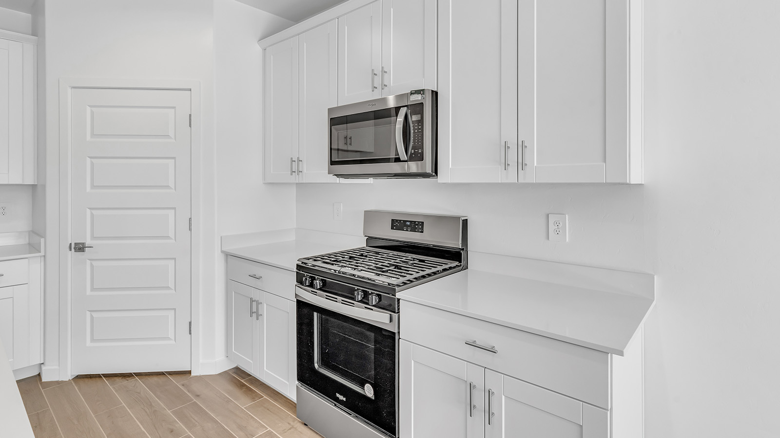 Discover The Harris, a beautifully designed new home at The Oasis at Rocking K, located in the serene surroundings of Vail, Arizona.  This charming one-story new home offers a seamless blend of style, functionality, and comfort, perfect for families and individuals alike. The Harris spans 1,856 square feet and includes four spacious bedrooms, two-and-a-half bathrooms, and a two-car garage, all meticulously crafted to meet the needs of modern living.  The exterior of The Harris offers three elevation options, each featuring D.R. Horton’s signature Spanish lace stucco, tile roofs, and professionally landscaped front yards with auto drip irrigation, adding to the home’s curb appeal. Inside, you’re greeted by an inviting foyer that leads to an open-concept living area, where the great room flows effortlessly into the dining area and a modern kitchen.  The kitchen is a chef's dream, equipped with top-of-the-line stainless steel appliances, quartz countertops, a large center island, and 42” shaker-style cabinets with stylish cabinet pulls. Adjacent to the kitchen, the dining area is perfect for family meals or entertaining guests. The great room, with its ample natural light and direct access to the covered patio, provides a perfect space for relaxation and gatherings.  The primary bedroom is a private sanctuary located at the back of the home, offering tranquility and easy access to the backyard. It features a walk-in closet and a luxurious en-suite bathroom with dual sinks and a large walk-in shower. The additional three bedrooms are generously sized, with two sharing a well-appointed full bathroom. A powder room, strategically placed near the living areas, adds convenience for guests.  Living at The Oasis at Rocking K means enjoying a variety of amenities, including ramadas, picnic areas, and access to the greater Rocking K master-planned community’s parks, walking trails, recreational facilities and events. Each home in this community also comes equipped with D.R. Horton’s Home is Connected® Smart Home package, offering the latest in modern living with features like a smart thermostat, video doorbell, and more.  Whether you’re looking for a home that offers space, style, or a sense of community, The Harris at The Oasis at Rocking K provides it all in a location that’s close to everything you need in Vail, Arizona.