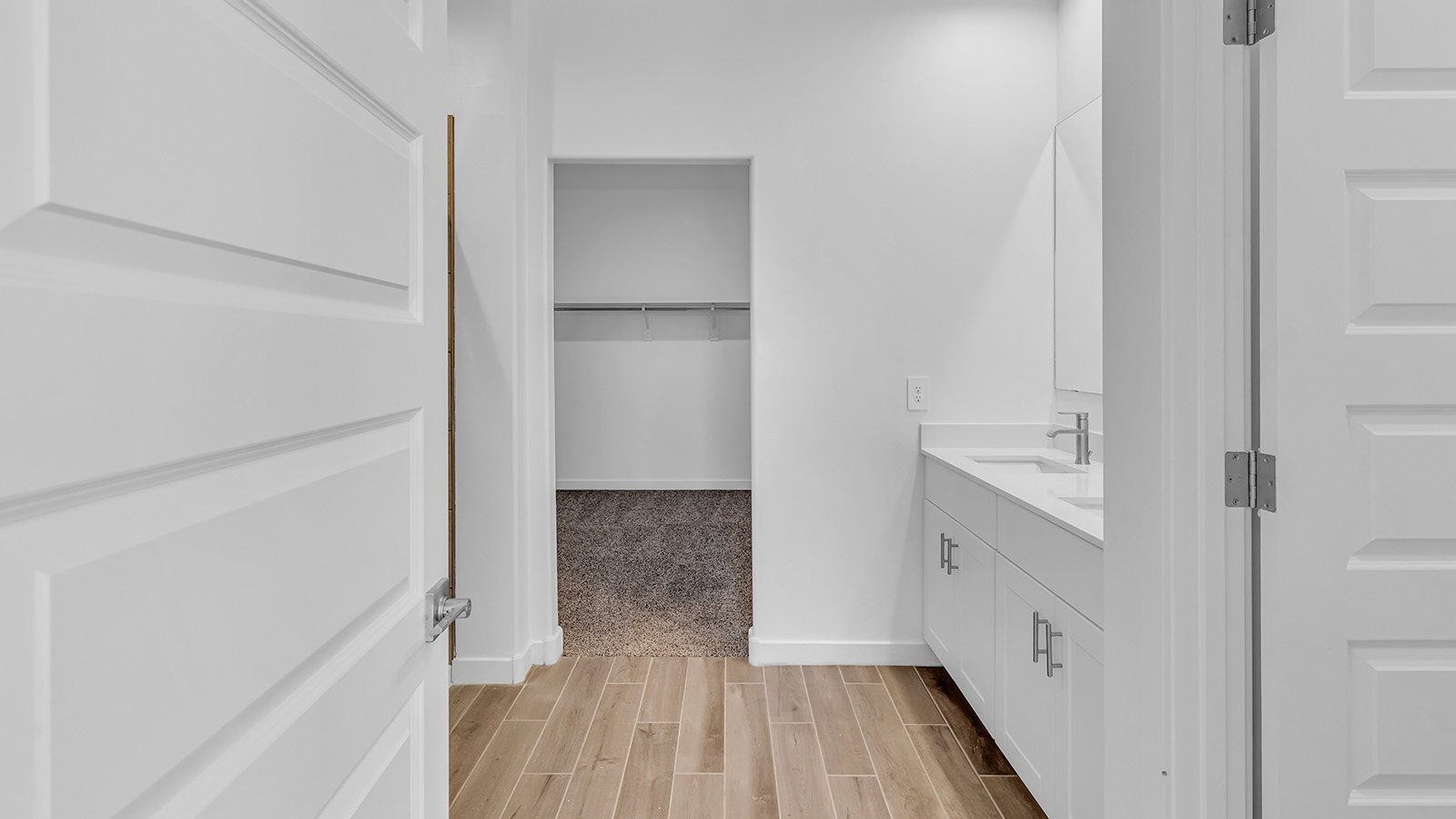 Discover The Harris, a beautifully designed new home at The Oasis at Rocking K, located in the serene surroundings of Vail, Arizona.  This charming one-story new home offers a seamless blend of style, functionality, and comfort, perfect for families and individuals alike. The Harris spans 1,856 square feet and includes four spacious bedrooms, two-and-a-half bathrooms, and a two-car garage, all meticulously crafted to meet the needs of modern living.  The exterior of The Harris offers three elevation options, each featuring D.R. Horton’s signature Spanish lace stucco, tile roofs, and professionally landscaped front yards with auto drip irrigation, adding to the home’s curb appeal. Inside, you’re greeted by an inviting foyer that leads to an open-concept living area, where the great room flows effortlessly into the dining area and a modern kitchen.  The kitchen is a chef's dream, equipped with top-of-the-line stainless steel appliances, quartz countertops, a large center island, and 42” shaker-style cabinets with stylish cabinet pulls. Adjacent to the kitchen, the dining area is perfect for family meals or entertaining guests. The great room, with its ample natural light and direct access to the covered patio, provides a perfect space for relaxation and gatherings.  The primary bedroom is a private sanctuary located at the back of the home, offering tranquility and easy access to the backyard. It features a walk-in closet and a luxurious en-suite bathroom with dual sinks and a large walk-in shower. The additional three bedrooms are generously sized, with two sharing a well-appointed full bathroom. A powder room, strategically placed near the living areas, adds convenience for guests.  Living at The Oasis at Rocking K means enjoying a variety of amenities, including ramadas, picnic areas, and access to the greater Rocking K master-planned community’s parks, walking trails, recreational facilities and events. Each home in this community also comes equipped with D.R. Horton’s Home is Connected® Smart Home package, offering the latest in modern living with features like a smart thermostat, video doorbell, and more.  Whether you’re looking for a home that offers space, style, or a sense of community, The Harris at The Oasis at Rocking K provides it all in a location that’s close to everything you need in Vail, Arizona.