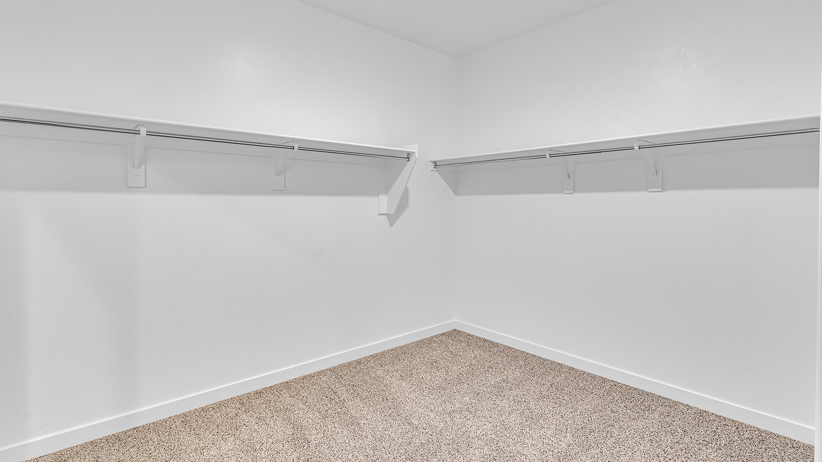 Discover The Harris, a beautifully designed new home at The Oasis at Rocking K, located in the serene surroundings of Vail, Arizona.  This charming one-story new home offers a seamless blend of style, functionality, and comfort, perfect for families and individuals alike. The Harris spans 1,856 square feet and includes four spacious bedrooms, two-and-a-half bathrooms, and a two-car garage, all meticulously crafted to meet the needs of modern living.  The exterior of The Harris offers three elevation options, each featuring D.R. Horton’s signature Spanish lace stucco, tile roofs, and professionally landscaped front yards with auto drip irrigation, adding to the home’s curb appeal. Inside, you’re greeted by an inviting foyer that leads to an open-concept living area, where the great room flows effortlessly into the dining area and a modern kitchen.  The kitchen is a chef's dream, equipped with top-of-the-line stainless steel appliances, quartz countertops, a large center island, and 42” shaker-style cabinets with stylish cabinet pulls. Adjacent to the kitchen, the dining area is perfect for family meals or entertaining guests. The great room, with its ample natural light and direct access to the covered patio, provides a perfect space for relaxation and gatherings.  The primary bedroom is a private sanctuary located at the back of the home, offering tranquility and easy access to the backyard. It features a walk-in closet and a luxurious en-suite bathroom with dual sinks and a large walk-in shower. The additional three bedrooms are generously sized, with two sharing a well-appointed full bathroom. A powder room, strategically placed near the living areas, adds convenience for guests.  Living at The Oasis at Rocking K means enjoying a variety of amenities, including ramadas, picnic areas, and access to the greater Rocking K master-planned community’s parks, walking trails, recreational facilities and events. Each home in this community also comes equipped with D.R. Horton’s Home is Connected® Smart Home package, offering the latest in modern living with features like a smart thermostat, video doorbell, and more.  Whether you’re looking for a home that offers space, style, or a sense of community, The Harris at The Oasis at Rocking K provides it all in a location that’s close to everything you need in Vail, Arizona.