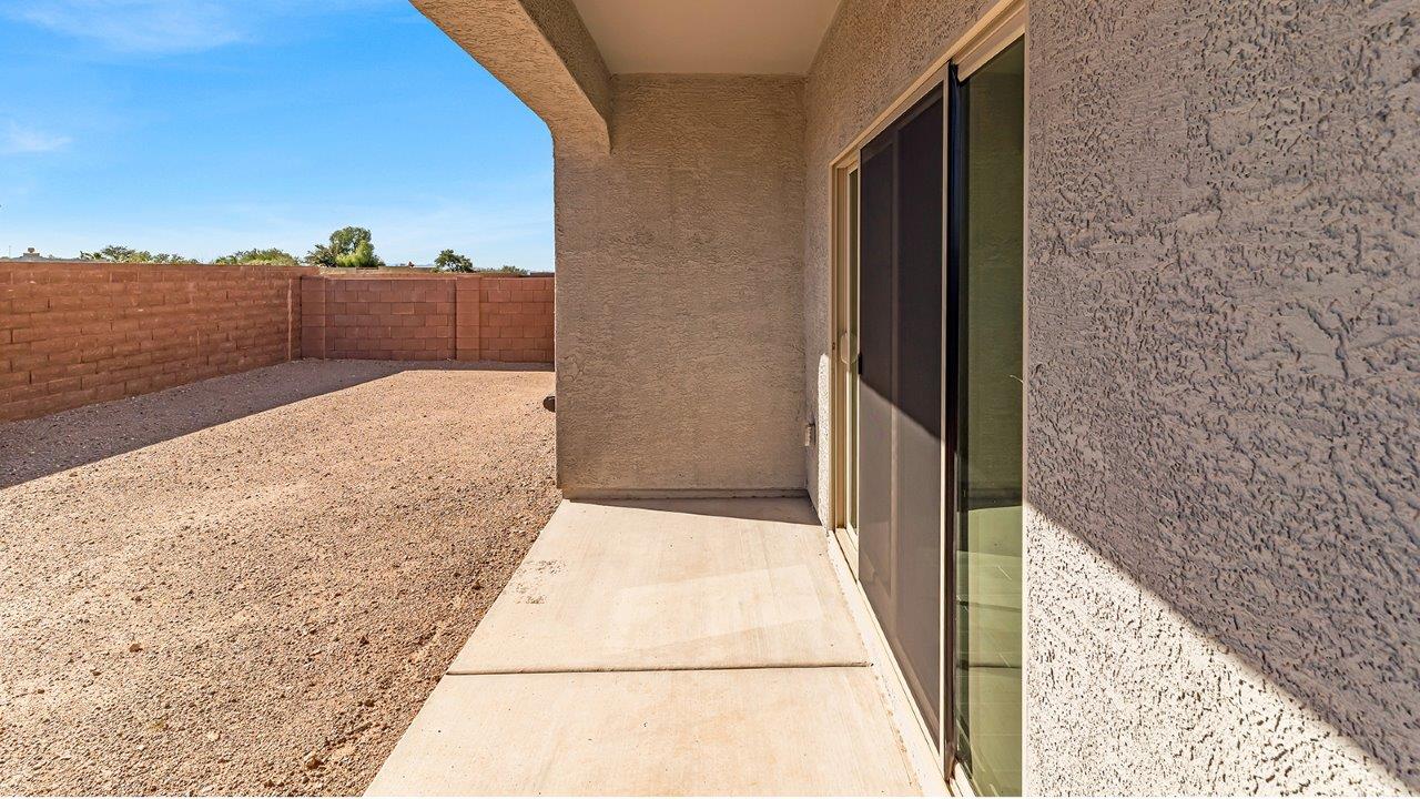 Discover The Harris, a beautifully designed new home at The Oasis at Rocking K, located in the serene surroundings of Vail, Arizona.  This charming one-story new home offers a seamless blend of style, functionality, and comfort, perfect for families and individuals alike. The Harris spans 1,856 square feet and includes four spacious bedrooms, two-and-a-half bathrooms, and a two-car garage, all meticulously crafted to meet the needs of modern living.  The exterior of The Harris offers three elevation options, each featuring D.R. Horton’s signature Spanish lace stucco, tile roofs, and professionally landscaped front yards with auto drip irrigation, adding to the home’s curb appeal. Inside, you’re greeted by an inviting foyer that leads to an open-concept living area, where the great room flows effortlessly into the dining area and a modern kitchen.  The kitchen is a chef's dream, equipped with top-of-the-line stainless steel appliances, quartz countertops, a large center island, and 42” shaker-style cabinets with stylish cabinet pulls. Adjacent to the kitchen, the dining area is perfect for family meals or entertaining guests. The great room, with its ample natural light and direct access to the covered patio, provides a perfect space for relaxation and gatherings.  The primary bedroom is a private sanctuary located at the back of the home, offering tranquility and easy access to the backyard. It features a walk-in closet and a luxurious en-suite bathroom with dual sinks and a large walk-in shower. The additional three bedrooms are generously sized, with two sharing a well-appointed full bathroom. A powder room, strategically placed near the living areas, adds convenience for guests.  Living at The Oasis at Rocking K means enjoying a variety of amenities, including ramadas, picnic areas, and access to the greater Rocking K master-planned community’s parks, walking trails, recreational facilities and events. Each home in this community also comes equipped with D.R. Horton’s Home is Connected® Smart Home package, offering the latest in modern living with features like a smart thermostat, video doorbell, and more.  Whether you’re looking for a home that offers space, style, or a sense of community, The Harris at The Oasis at Rocking K provides it all in a location that’s close to everything you need in Vail, Arizona.