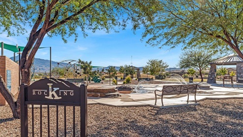 Welcome to The Oasis at Rocking K, a premier D.R. Horton new home community nestled in the picturesque landscapes of Vail, Arizona, where new homes blend seamlessly with the breathtaking surroundings of the Rincon Mountains. Experience the perfect balance of tranquility and modern convenience in this master-planned neighborhood, designed to offer a lifestyle that caters to families, nature enthusiasts, and anyone seeking a peaceful yet connected community. The Oasis at Rocking K features five beautifully designed one-story floor plans ranging from 1,400 to 1,900 square feet, each crafted with the high-quality features and finishes D.R. Horton is known for. Homes in Rocking K feature a Spanish lace stucco exterior, tile roofs, and meticulously landscaped front yards with auto drip irrigation. Inside, you’ll find luxurious quartz countertops in the kitchens and bathrooms, 42” shaker-style cabinets with modern cabinet pulls, and wood-look tile flooring throughout the main living areas. Homes also include covered front porches and back patios, perfect for enjoying Arizona’s stunning sunsets and clear night skies. Each home in The Oasis at Rocking K is equipped with D.R. Horton’s Home is Connected® Smart Home package, which includes a smart thermostat, video doorbell, keyless entry, Wi-Fi-enabled garage door opener, and Deako light switches. Additionally, these homes meet the stringent DOE Zero Energy Ready Home standards, making them not only comfortable and modern but also exceptionally energy-efficient. With features like spray foam insulation, tankless water heaters and LED lighting, these homes are designed to reduce your environmental footprint and provide long-term savings on energy costs. Living at Rocking K means being part of a vibrant, family-oriented community with a strong sense of connection among residents. The Oasis at Rocking K offers a variety of amenities, including ramadas, picnic tables, and grassy areas perfect for gatherings. Residents also have access to the greater Rocking K master-planned neighborhood amenities, such as a splashpad, large event lawn, walking paths, multipurpose fields, basketball and pickleball courts, and an innovative playground with a zip-line and jungle gym. The new K-8 school, set to open in 2025, is just one of the many features that make Rocking K ideal for families. Life at Rocking K is further enriched by a lively calendar of lifestyle events, thoughtfully organized by the Rocking K Homeowners Association. These events are a cornerstone of community life, fostering a strong sense of connection among residents. Whether you’re looking to enjoy a quiet evening star gazing in the park or engage in fun activities with neighbors, there’s always something happening. The quarterly lifestyle calendar is packed with regular and seasonal events, including movie nights in the park, sports and summer camps for kids, and wine tasting events for adults. Families can join hiking groups, participate in trivia nights, or enjoy the various holiday celebrations. The community comes alive during the holidays with loads of themed events, arts and crafts fairs, and car shows. Rocking K’s commitment to providing a dynamic and engaging environment ensures that there’s always an opportunity to make memories and build lasting friendships right in your neighborhood. Residents of Rocking K benefit from easy access to I-10, making commutes to Tucson and surrounding areas a breeze. The community is close to major employers such as Davis-Monthan Air Force Base, Raytheon, and the University of Arizona, as well as top-notch healthcare facilities like TMC Rincon and Northwest Hospital East. The nearby Houghton Town Center and Houghton Rd. business corridor offer convenient shopping, dining, and services. For outdoor enthusiasts, Rocking K is surrounded by natural beauty and recreational opportunities. Explore the hiking and biking trails at Colossal Cave Mountain Park, Saguaro National Park East, and the Arizona Trail. Enjoy golfing at Del Lago Golf Course, or take a short drive to Sonoita for a day trip to Arizona’s Wine Country. Whether it’s hiking, camping, or simply taking in the stunning views, Rocking K is your gateway to the great outdoors. With 360-degree mountain views, calm and quiet evenings, and a location that’s close to everything you need, Rocking K is truly a community where you can thrive. Experience the best of Arizona living at The Oasis at Rocking K, where your new home awaits in a community that offers everything you need for a fulfilling lifestyle.