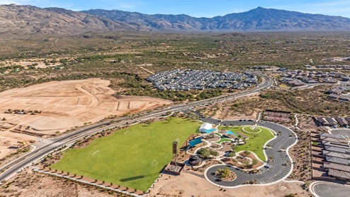 Welcome to The Oasis at Rocking K, a premier D.R. Horton new home community nestled in the picturesque landscapes of Vail, Arizona, where new homes blend seamlessly with the breathtaking surroundings of the Rincon Mountains. Experience the perfect balance of tranquility and modern convenience in this master-planned neighborhood, designed to offer a lifestyle that caters to families, nature enthusiasts, and anyone seeking a peaceful yet connected community. The Oasis at Rocking K features five beautifully designed one-story floor plans ranging from 1,400 to 1,900 square feet, each crafted with the high-quality features and finishes D.R. Horton is known for. Homes in Rocking K feature a Spanish lace stucco exterior, tile roofs, and meticulously landscaped front yards with auto drip irrigation. Inside, you’ll find luxurious quartz countertops in the kitchens and bathrooms, 42” shaker-style cabinets with modern cabinet pulls, and wood-look tile flooring throughout the main living areas. Homes also include covered front porches and back patios, perfect for enjoying Arizona’s stunning sunsets and clear night skies. Each home in The Oasis at Rocking K is equipped with D.R. Horton’s Home is Connected® Smart Home package, which includes a smart thermostat, video doorbell, keyless entry, Wi-Fi-enabled garage door opener, and Deako light switches. Additionally, these homes meet the stringent DOE Zero Energy Ready Home standards, making them not only comfortable and modern but also exceptionally energy-efficient. With features like spray foam insulation, tankless water heaters and LED lighting, these homes are designed to reduce your environmental footprint and provide long-term savings on energy costs. Living at Rocking K means being part of a vibrant, family-oriented community with a strong sense of connection among residents. The Oasis at Rocking K offers a variety of amenities, including ramadas, picnic tables, and grassy areas perfect for gatherings. Residents also have access to the greater Rocking K master-planned neighborhood amenities, such as a splashpad, large event lawn, walking paths, multipurpose fields, basketball and pickleball courts, and an innovative playground with a zip-line and jungle gym. The new K-8 school, set to open in 2025, is just one of the many features that make Rocking K ideal for families. Life at Rocking K is further enriched by a lively calendar of lifestyle events, thoughtfully organized by the Rocking K Homeowners Association. These events are a cornerstone of community life, fostering a strong sense of connection among residents. Whether you’re looking to enjoy a quiet evening star gazing in the park or engage in fun activities with neighbors, there’s always something happening. The quarterly lifestyle calendar is packed with regular and seasonal events, including movie nights in the park, sports and summer camps for kids, and wine tasting events for adults. Families can join hiking groups, participate in trivia nights, or enjoy the various holiday celebrations. The community comes alive during the holidays with loads of themed events, arts and crafts fairs, and car shows. Rocking K’s commitment to providing a dynamic and engaging environment ensures that there’s always an opportunity to make memories and build lasting friendships right in your neighborhood. Residents of Rocking K benefit from easy access to I-10, making commutes to Tucson and surrounding areas a breeze. The community is close to major employers such as Davis-Monthan Air Force Base, Raytheon, and the University of Arizona, as well as top-notch healthcare facilities like TMC Rincon and Northwest Hospital East. The nearby Houghton Town Center and Houghton Rd. business corridor offer convenient shopping, dining, and services. For outdoor enthusiasts, Rocking K is surrounded by natural beauty and recreational opportunities. Explore the hiking and biking trails at Colossal Cave Mountain Park, Saguaro National Park East, and the Arizona Trail. Enjoy golfing at Del Lago Golf Course, or take a short drive to Sonoita for a day trip to Arizona’s Wine Country. Whether it’s hiking, camping, or simply taking in the stunning views, Rocking K is your gateway to the great outdoors. With 360-degree mountain views, calm and quiet evenings, and a location that’s close to everything you need, Rocking K is truly a community where you can thrive. Experience the best of Arizona living at The Oasis at Rocking K, where your new home awaits in a community that offers everything you need for a fulfilling lifestyle.