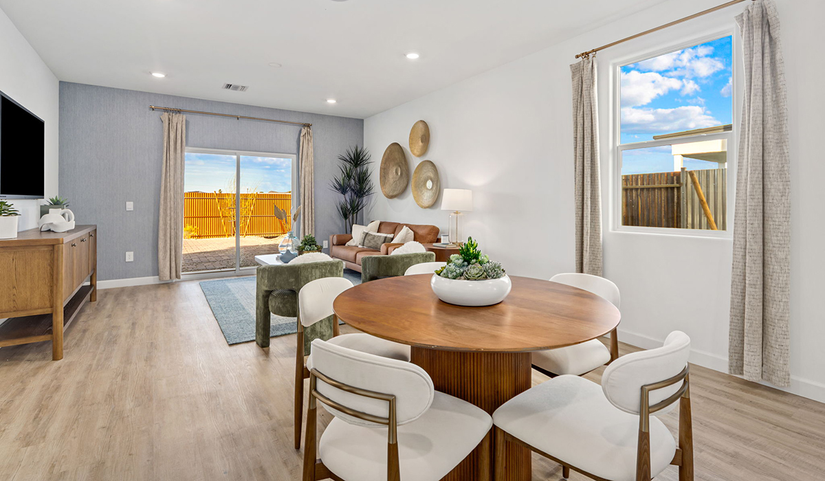 Welcome to The Caroline, a new floor plan available at The Oasis at Rocking K by D.R. Horton in Vail, Arizona. This single-story new home is 1,536 square feet and is thoughtfully planned out throughout the living spaces. The Caroline offers three bedrooms and two bathrooms, making it ideal for families who value both space and convenience.  As you enter through the inviting covered porch, you’re greeted by a bright and airy entryway that flows into the heart of the home. The expansive great room, dining area, and kitchen are thoughtfully connected, creating an ideal space for entertaining or enjoying time with family.  The Caroline’s layout includes a generously sized primary bedroom, carefully positioned for privacy at the rear of the home. This spacious room features a large walk-in closet and an en-suite bathroom. The additional two bedrooms are well-sized and located in separate areas of the home with easy access to the main full bathroom.  The Caroline is designed with energy efficiency in mind and features a tankless water heater, energy-efficient LED lighting, and high-performance insulation, helping to lower utility costs. Additionally, this home is equipped with D.R. Horton’s Home is Connected Smart Home package, which includes a smart thermostat, video doorbell, keyless entry, and Wi-Fi® enabled garage door opener.  Step outside to a spacious backyard, where you can unwind and enjoy Vail’s beautiful weather year-round. Whether you’re sipping your morning coffee or hosting a weekend barbecue, this outdoor space serene surroundings of Rocking K.  Living in Rocking K offers a variety of amenities, including playgrounds with jungle gyms, parks, ramadas, and walking and biking trails that encourage a healthy and active lifestyles.  *Images shown are for reference only. They depict The Caroline sales model home and may not represent the actual home.