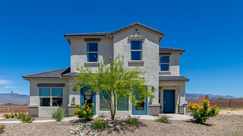 Discover the new homes at Hanson Ridge, a peaceful D.R. Horton community located in the scenic town of Vail, Arizona. Tucked away from the hustle and bustle of city life, Hanson Ridge offers a serene lifestyle with incredible desert landscapes and mountain views, while still providing easy access to I-10, making commutes to Tucson and surrounding areas convenient. Whether you’re seeking tranquility or proximity to modern conveniences, Hanson Ridge delivers the best of both worlds. This thoughtfully planned community features a variety of spacious one- and two-story homes, ranging from 1,300 to 2,500 square feet, designed to accommodate diverse lifestyles. Each home at Hanson Ridge is equipped with high-quality features, including granite countertops in the kitchens and bathrooms, 42" shaker-style cabinets, and beautiful 18"x18" tile flooring. The homes also feature covered front porches and back patios, providing the perfect spaces to enjoy Arizona’s beautiful weather. The community is designed with spacious lots, and generous pool-ready backyards, giving you the flexibility to customize your own outdoor oasis. Hanson Ridge is built with energy efficiency in mind, meeting the DOE Zero Energy Ready Home standards. These high-performance homes are so energy-efficient that a renewable energy system could offset most or all of the home's annual energy use. With advanced features such as a tankless water heater, energy-efficient LED lighting, a smart thermostat and more, these homes offer both comfort and sustainability. Additionally, the Home is Connected® Smart Home package built into every home includes a video doorbell, keyless entry, Deako smart switches a Wi-Fi-enabled garage door opener and more, ensuring that modern convenience is at your fingertips whether you're at home or away. Residents of Hanson Ridge enjoy a strong sense of community, with parks, walking paths, and playgrounds sprinkled throughout the neighborhood, fostering connections among families and neighbors. The Vail Unified School District, renowned for its exceptional educational standards, serves this community, with Acacia Elementary School, Old Vail Middle School, and Cienega High School all located nearby. The location of Hanson Ridge provides residents with easy access to a variety of outdoor and recreational activities. Explore the nearby Rincon Mountains, hike through Saguaro National Park, or visit Colossal Cave Mountain Park and Cienega Creek Natural Preserve. For those who enjoy golfing, Del Lago Golf Course is just minutes away. The community’s proximity to major employers such as Raytheon, UA Tech Park, Davis-Monthan Air Force Base, and the Target Distribution Center makes it an ideal choice for working professionals. In addition to its natural beauty and recreational offerings, Hanson Ridge is just a short drive from the town center, where you’ll find shopping, dining, and entertainment options. Visit the Pima County Fairgrounds, enjoy a movie at Galaxy Theatres, or explore the historic Cienega Bridge landmark. For a weekend getaway, Sonoita’s Wine Country is just 30 minutes away, offering cooler climates, picturesque vineyards, and outdoor adventures. Hanson Ridge offers a unique blend of peaceful, rural living with the convenience of nearby urban amenities. Experience the charm and comfort of Hanson Ridge, where your new home awaits.