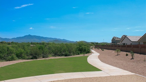 Discover the new homes at Hanson Ridge, a peaceful D.R. Horton community located in the scenic town of Vail, Arizona. Tucked away from the hustle and bustle of city life, Hanson Ridge offers a serene lifestyle with incredible desert landscapes and mountain views, while still providing easy access to I-10, making commutes to Tucson and surrounding areas convenient. Whether you’re seeking tranquility or proximity to modern conveniences, Hanson Ridge delivers the best of both worlds. This thoughtfully planned community features a variety of spacious one- and two-story homes, ranging from 1,300 to 2,500 square feet, designed to accommodate diverse lifestyles. Each home at Hanson Ridge is equipped with high-quality features, including granite countertops in the kitchens and bathrooms, 42" shaker-style cabinets, and beautiful 18"x18" tile flooring. The homes also feature covered front porches and back patios, providing the perfect spaces to enjoy Arizona’s beautiful weather. The community is designed with spacious lots, and generous pool-ready backyards, giving you the flexibility to customize your own outdoor oasis. Hanson Ridge is built with energy efficiency in mind, meeting the DOE Zero Energy Ready Home standards. These high-performance homes are so energy-efficient that a renewable energy system could offset most or all of the home's annual energy use. With advanced features such as a tankless water heater, energy-efficient LED lighting, a smart thermostat and more, these homes offer both comfort and sustainability. Additionally, the Home is Connected® Smart Home package built into every home includes a video doorbell, keyless entry, Deako smart switches a Wi-Fi-enabled garage door opener and more, ensuring that modern convenience is at your fingertips whether you're at home or away. Residents of Hanson Ridge enjoy a strong sense of community, with parks, walking paths, and playgrounds sprinkled throughout the neighborhood, fostering connections among families and neighbors. The Vail Unified School District, renowned for its exceptional educational standards, serves this community, with Acacia Elementary School, Old Vail Middle School, and Cienega High School all located nearby. The location of Hanson Ridge provides residents with easy access to a variety of outdoor and recreational activities. Explore the nearby Rincon Mountains, hike through Saguaro National Park, or visit Colossal Cave Mountain Park and Cienega Creek Natural Preserve. For those who enjoy golfing, Del Lago Golf Course is just minutes away. The community’s proximity to major employers such as Raytheon, UA Tech Park, Davis-Monthan Air Force Base, and the Target Distribution Center makes it an ideal choice for working professionals. In addition to its natural beauty and recreational offerings, Hanson Ridge is just a short drive from the town center, where you’ll find shopping, dining, and entertainment options. Visit the Pima County Fairgrounds, enjoy a movie at Galaxy Theatres, or explore the historic Cienega Bridge landmark. For a weekend getaway, Sonoita’s Wine Country is just 30 minutes away, offering cooler climates, picturesque vineyards, and outdoor adventures. Hanson Ridge offers a unique blend of peaceful, rural living with the convenience of nearby urban amenities. Experience the charm and comfort of Hanson Ridge, where your new home awaits.