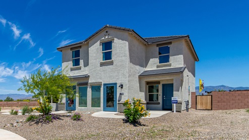 Discover the new homes at Hanson Ridge, a peaceful D.R. Horton community located in the scenic town of Vail, Arizona. Tucked away from the hustle and bustle of city life, Hanson Ridge offers a serene lifestyle with incredible desert landscapes and mountain views, while still providing easy access to I-10, making commutes to Tucson and surrounding areas convenient. Whether you’re seeking tranquility or proximity to modern conveniences, Hanson Ridge delivers the best of both worlds. This thoughtfully planned community features a variety of spacious one- and two-story homes, ranging from 1,300 to 2,500 square feet, designed to accommodate diverse lifestyles. Each home at Hanson Ridge is equipped with high-quality features, including granite countertops in the kitchens and bathrooms, 42" shaker-style cabinets, and beautiful 18"x18" tile flooring. The homes also feature covered front porches and back patios, providing the perfect spaces to enjoy Arizona’s beautiful weather. The community is designed with spacious lots, and generous pool-ready backyards, giving you the flexibility to customize your own outdoor oasis. Hanson Ridge is built with energy efficiency in mind, meeting the DOE Zero Energy Ready Home standards. These high-performance homes are so energy-efficient that a renewable energy system could offset most or all of the home's annual energy use. With advanced features such as a tankless water heater, energy-efficient LED lighting, a smart thermostat and more, these homes offer both comfort and sustainability. Additionally, the Home is Connected® Smart Home package built into every home includes a video doorbell, keyless entry, Deako smart switches a Wi-Fi-enabled garage door opener and more, ensuring that modern convenience is at your fingertips whether you're at home or away. Residents of Hanson Ridge enjoy a strong sense of community, with parks, walking paths, and playgrounds sprinkled throughout the neighborhood, fostering connections among families and neighbors. The Vail Unified School District, renowned for its exceptional educational standards, serves this community, with Acacia Elementary School, Old Vail Middle School, and Cienega High School all located nearby. The location of Hanson Ridge provides residents with easy access to a variety of outdoor and recreational activities. Explore the nearby Rincon Mountains, hike through Saguaro National Park, or visit Colossal Cave Mountain Park and Cienega Creek Natural Preserve. For those who enjoy golfing, Del Lago Golf Course is just minutes away. The community’s proximity to major employers such as Raytheon, UA Tech Park, Davis-Monthan Air Force Base, and the Target Distribution Center makes it an ideal choice for working professionals. In addition to its natural beauty and recreational offerings, Hanson Ridge is just a short drive from the town center, where you’ll find shopping, dining, and entertainment options. Visit the Pima County Fairgrounds, enjoy a movie at Galaxy Theatres, or explore the historic Cienega Bridge landmark. For a weekend getaway, Sonoita’s Wine Country is just 30 minutes away, offering cooler climates, picturesque vineyards, and outdoor adventures. Hanson Ridge offers a unique blend of peaceful, rural living with the convenience of nearby urban amenities. Experience the charm and comfort of Hanson Ridge, where your new home awaits.