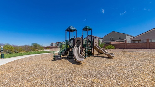 Discover the new homes at Hanson Ridge, a peaceful D.R. Horton community located in the scenic town of Vail, Arizona. Tucked away from the hustle and bustle of city life, Hanson Ridge offers a serene lifestyle with incredible desert landscapes and mountain views, while still providing easy access to I-10, making commutes to Tucson and surrounding areas convenient. Whether you’re seeking tranquility or proximity to modern conveniences, Hanson Ridge delivers the best of both worlds. This thoughtfully planned community features a variety of spacious one- and two-story homes, ranging from 1,300 to 2,500 square feet, designed to accommodate diverse lifestyles. Each home at Hanson Ridge is equipped with high-quality features, including granite countertops in the kitchens and bathrooms, 42" shaker-style cabinets, and beautiful 18"x18" tile flooring. The homes also feature covered front porches and back patios, providing the perfect spaces to enjoy Arizona’s beautiful weather. The community is designed with spacious lots, and generous pool-ready backyards, giving you the flexibility to customize your own outdoor oasis. Hanson Ridge is built with energy efficiency in mind, meeting the DOE Zero Energy Ready Home standards. These high-performance homes are so energy-efficient that a renewable energy system could offset most or all of the home's annual energy use. With advanced features such as a tankless water heater, energy-efficient LED lighting, a smart thermostat and more, these homes offer both comfort and sustainability. Additionally, the Home is Connected® Smart Home package built into every home includes a video doorbell, keyless entry, Deako smart switches a Wi-Fi-enabled garage door opener and more, ensuring that modern convenience is at your fingertips whether you're at home or away. Residents of Hanson Ridge enjoy a strong sense of community, with parks, walking paths, and playgrounds sprinkled throughout the neighborhood, fostering connections among families and neighbors. The Vail Unified School District, renowned for its exceptional educational standards, serves this community, with Acacia Elementary School, Old Vail Middle School, and Cienega High School all located nearby. The location of Hanson Ridge provides residents with easy access to a variety of outdoor and recreational activities. Explore the nearby Rincon Mountains, hike through Saguaro National Park, or visit Colossal Cave Mountain Park and Cienega Creek Natural Preserve. For those who enjoy golfing, Del Lago Golf Course is just minutes away. The community’s proximity to major employers such as Raytheon, UA Tech Park, Davis-Monthan Air Force Base, and the Target Distribution Center makes it an ideal choice for working professionals. In addition to its natural beauty and recreational offerings, Hanson Ridge is just a short drive from the town center, where you’ll find shopping, dining, and entertainment options. Visit the Pima County Fairgrounds, enjoy a movie at Galaxy Theatres, or explore the historic Cienega Bridge landmark. For a weekend getaway, Sonoita’s Wine Country is just 30 minutes away, offering cooler climates, picturesque vineyards, and outdoor adventures. Hanson Ridge offers a unique blend of peaceful, rural living with the convenience of nearby urban amenities. Experience the charm and comfort of Hanson Ridge, where your new home awaits.