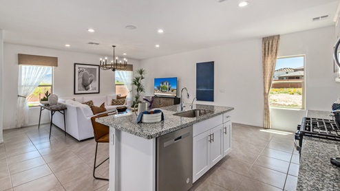 Discover the new homes at Hanson Ridge, a peaceful D.R. Horton community located in the scenic town of Vail, Arizona. Tucked away from the hustle and bustle of city life, Hanson Ridge offers a serene lifestyle with incredible desert landscapes and mountain views, while still providing easy access to I-10, making commutes to Tucson and surrounding areas convenient. Whether you’re seeking tranquility or proximity to modern conveniences, Hanson Ridge delivers the best of both worlds. This thoughtfully planned community features a variety of spacious one- and two-story homes, ranging from 1,300 to 2,500 square feet, designed to accommodate diverse lifestyles. Each home at Hanson Ridge is equipped with high-quality features, including granite countertops in the kitchens and bathrooms, 42" shaker-style cabinets, and beautiful 18"x18" tile flooring. The homes also feature covered front porches and back patios, providing the perfect spaces to enjoy Arizona’s beautiful weather. The community is designed with spacious lots, and generous pool-ready backyards, giving you the flexibility to customize your own outdoor oasis. Hanson Ridge is built with energy efficiency in mind, meeting the DOE Zero Energy Ready Home standards. These high-performance homes are so energy-efficient that a renewable energy system could offset most or all of the home's annual energy use. With advanced features such as a tankless water heater, energy-efficient LED lighting, a smart thermostat and more, these homes offer both comfort and sustainability. Additionally, the Home is Connected® Smart Home package built into every home includes a video doorbell, keyless entry, Deako smart switches a Wi-Fi-enabled garage door opener and more, ensuring that modern convenience is at your fingertips whether you're at home or away. Residents of Hanson Ridge enjoy a strong sense of community, with parks, walking paths, and playgrounds sprinkled throughout the neighborhood, fostering connections among families and neighbors. The Vail Unified School District, renowned for its exceptional educational standards, serves this community, with Acacia Elementary School, Old Vail Middle School, and Cienega High School all located nearby. The location of Hanson Ridge provides residents with easy access to a variety of outdoor and recreational activities. Explore the nearby Rincon Mountains, hike through Saguaro National Park, or visit Colossal Cave Mountain Park and Cienega Creek Natural Preserve. For those who enjoy golfing, Del Lago Golf Course is just minutes away. The community’s proximity to major employers such as Raytheon, UA Tech Park, Davis-Monthan Air Force Base, and the Target Distribution Center makes it an ideal choice for working professionals. In addition to its natural beauty and recreational offerings, Hanson Ridge is just a short drive from the town center, where you’ll find shopping, dining, and entertainment options. Visit the Pima County Fairgrounds, enjoy a movie at Galaxy Theatres, or explore the historic Cienega Bridge landmark. For a weekend getaway, Sonoita’s Wine Country is just 30 minutes away, offering cooler climates, picturesque vineyards, and outdoor adventures. Hanson Ridge offers a unique blend of peaceful, rural living with the convenience of nearby urban amenities. Experience the charm and comfort of Hanson Ridge, where your new home awaits.