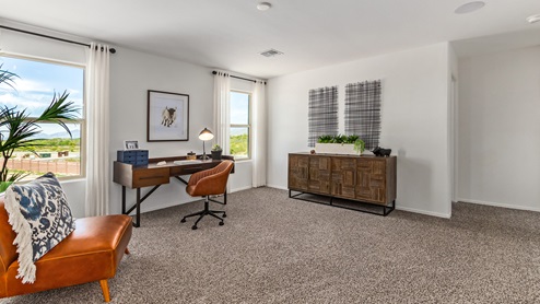 Discover the new homes at Hanson Ridge, a peaceful D.R. Horton community located in the scenic town of Vail, Arizona. Tucked away from the hustle and bustle of city life, Hanson Ridge offers a serene lifestyle with incredible desert landscapes and mountain views, while still providing easy access to I-10, making commutes to Tucson and surrounding areas convenient. Whether you’re seeking tranquility or proximity to modern conveniences, Hanson Ridge delivers the best of both worlds. This thoughtfully planned community features a variety of spacious one- and two-story homes, ranging from 1,300 to 2,500 square feet, designed to accommodate diverse lifestyles. Each home at Hanson Ridge is equipped with high-quality features, including granite countertops in the kitchens and bathrooms, 42" shaker-style cabinets, and beautiful 18"x18" tile flooring. The homes also feature covered front porches and back patios, providing the perfect spaces to enjoy Arizona’s beautiful weather. The community is designed with spacious lots, and generous pool-ready backyards, giving you the flexibility to customize your own outdoor oasis. Hanson Ridge is built with energy efficiency in mind, meeting the DOE Zero Energy Ready Home standards. These high-performance homes are so energy-efficient that a renewable energy system could offset most or all of the home's annual energy use. With advanced features such as a tankless water heater, energy-efficient LED lighting, a smart thermostat and more, these homes offer both comfort and sustainability. Additionally, the Home is Connected® Smart Home package built into every home includes a video doorbell, keyless entry, Deako smart switches a Wi-Fi-enabled garage door opener and more, ensuring that modern convenience is at your fingertips whether you're at home or away. Residents of Hanson Ridge enjoy a strong sense of community, with parks, walking paths, and playgrounds sprinkled throughout the neighborhood, fostering connections among families and neighbors. The Vail Unified School District, renowned for its exceptional educational standards, serves this community, with Acacia Elementary School, Old Vail Middle School, and Cienega High School all located nearby. The location of Hanson Ridge provides residents with easy access to a variety of outdoor and recreational activities. Explore the nearby Rincon Mountains, hike through Saguaro National Park, or visit Colossal Cave Mountain Park and Cienega Creek Natural Preserve. For those who enjoy golfing, Del Lago Golf Course is just minutes away. The community’s proximity to major employers such as Raytheon, UA Tech Park, Davis-Monthan Air Force Base, and the Target Distribution Center makes it an ideal choice for working professionals. In addition to its natural beauty and recreational offerings, Hanson Ridge is just a short drive from the town center, where you’ll find shopping, dining, and entertainment options. Visit the Pima County Fairgrounds, enjoy a movie at Galaxy Theatres, or explore the historic Cienega Bridge landmark. For a weekend getaway, Sonoita’s Wine Country is just 30 minutes away, offering cooler climates, picturesque vineyards, and outdoor adventures. Hanson Ridge offers a unique blend of peaceful, rural living with the convenience of nearby urban amenities. Experience the charm and comfort of Hanson Ridge, where your new home awaits.