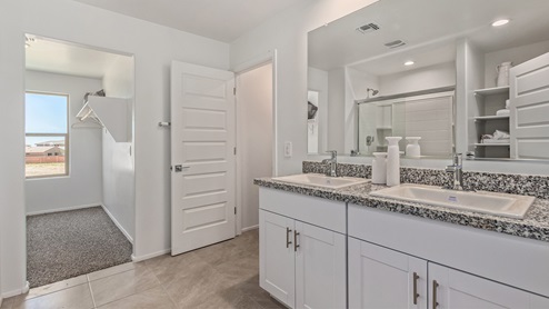 Discover the new homes at Hanson Ridge, a peaceful D.R. Horton community located in the scenic town of Vail, Arizona. Tucked away from the hustle and bustle of city life, Hanson Ridge offers a serene lifestyle with incredible desert landscapes and mountain views, while still providing easy access to I-10, making commutes to Tucson and surrounding areas convenient. Whether you’re seeking tranquility or proximity to modern conveniences, Hanson Ridge delivers the best of both worlds. This thoughtfully planned community features a variety of spacious one- and two-story homes, ranging from 1,300 to 2,500 square feet, designed to accommodate diverse lifestyles. Each home at Hanson Ridge is equipped with high-quality features, including granite countertops in the kitchens and bathrooms, 42" shaker-style cabinets, and beautiful 18"x18" tile flooring. The homes also feature covered front porches and back patios, providing the perfect spaces to enjoy Arizona’s beautiful weather. The community is designed with spacious lots, and generous pool-ready backyards, giving you the flexibility to customize your own outdoor oasis. Hanson Ridge is built with energy efficiency in mind, meeting the DOE Zero Energy Ready Home standards. These high-performance homes are so energy-efficient that a renewable energy system could offset most or all of the home's annual energy use. With advanced features such as a tankless water heater, energy-efficient LED lighting, a smart thermostat and more, these homes offer both comfort and sustainability. Additionally, the Home is Connected® Smart Home package built into every home includes a video doorbell, keyless entry, Deako smart switches a Wi-Fi-enabled garage door opener and more, ensuring that modern convenience is at your fingertips whether you're at home or away. Residents of Hanson Ridge enjoy a strong sense of community, with parks, walking paths, and playgrounds sprinkled throughout the neighborhood, fostering connections among families and neighbors. The Vail Unified School District, renowned for its exceptional educational standards, serves this community, with Acacia Elementary School, Old Vail Middle School, and Cienega High School all located nearby. The location of Hanson Ridge provides residents with easy access to a variety of outdoor and recreational activities. Explore the nearby Rincon Mountains, hike through Saguaro National Park, or visit Colossal Cave Mountain Park and Cienega Creek Natural Preserve. For those who enjoy golfing, Del Lago Golf Course is just minutes away. The community’s proximity to major employers such as Raytheon, UA Tech Park, Davis-Monthan Air Force Base, and the Target Distribution Center makes it an ideal choice for working professionals. In addition to its natural beauty and recreational offerings, Hanson Ridge is just a short drive from the town center, where you’ll find shopping, dining, and entertainment options. Visit the Pima County Fairgrounds, enjoy a movie at Galaxy Theatres, or explore the historic Cienega Bridge landmark. For a weekend getaway, Sonoita’s Wine Country is just 30 minutes away, offering cooler climates, picturesque vineyards, and outdoor adventures. Hanson Ridge offers a unique blend of peaceful, rural living with the convenience of nearby urban amenities. Experience the charm and comfort of Hanson Ridge, where your new home awaits.