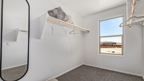 Discover the new homes at Hanson Ridge, a peaceful D.R. Horton community located in the scenic town of Vail, Arizona. Tucked away from the hustle and bustle of city life, Hanson Ridge offers a serene lifestyle with incredible desert landscapes and mountain views, while still providing easy access to I-10, making commutes to Tucson and surrounding areas convenient. Whether you’re seeking tranquility or proximity to modern conveniences, Hanson Ridge delivers the best of both worlds. This thoughtfully planned community features a variety of spacious one- and two-story homes, ranging from 1,300 to 2,500 square feet, designed to accommodate diverse lifestyles. Each home at Hanson Ridge is equipped with high-quality features, including granite countertops in the kitchens and bathrooms, 42" shaker-style cabinets, and beautiful 18"x18" tile flooring. The homes also feature covered front porches and back patios, providing the perfect spaces to enjoy Arizona’s beautiful weather. The community is designed with spacious lots, and generous pool-ready backyards, giving you the flexibility to customize your own outdoor oasis. Hanson Ridge is built with energy efficiency in mind, meeting the DOE Zero Energy Ready Home standards. These high-performance homes are so energy-efficient that a renewable energy system could offset most or all of the home's annual energy use. With advanced features such as a tankless water heater, energy-efficient LED lighting, a smart thermostat and more, these homes offer both comfort and sustainability. Additionally, the Home is Connected® Smart Home package built into every home includes a video doorbell, keyless entry, Deako smart switches a Wi-Fi-enabled garage door opener and more, ensuring that modern convenience is at your fingertips whether you're at home or away. Residents of Hanson Ridge enjoy a strong sense of community, with parks, walking paths, and playgrounds sprinkled throughout the neighborhood, fostering connections among families and neighbors. The Vail Unified School District, renowned for its exceptional educational standards, serves this community, with Acacia Elementary School, Old Vail Middle School, and Cienega High School all located nearby. The location of Hanson Ridge provides residents with easy access to a variety of outdoor and recreational activities. Explore the nearby Rincon Mountains, hike through Saguaro National Park, or visit Colossal Cave Mountain Park and Cienega Creek Natural Preserve. For those who enjoy golfing, Del Lago Golf Course is just minutes away. The community’s proximity to major employers such as Raytheon, UA Tech Park, Davis-Monthan Air Force Base, and the Target Distribution Center makes it an ideal choice for working professionals. In addition to its natural beauty and recreational offerings, Hanson Ridge is just a short drive from the town center, where you’ll find shopping, dining, and entertainment options. Visit the Pima County Fairgrounds, enjoy a movie at Galaxy Theatres, or explore the historic Cienega Bridge landmark. For a weekend getaway, Sonoita’s Wine Country is just 30 minutes away, offering cooler climates, picturesque vineyards, and outdoor adventures. Hanson Ridge offers a unique blend of peaceful, rural living with the convenience of nearby urban amenities. Experience the charm and comfort of Hanson Ridge, where your new home awaits.