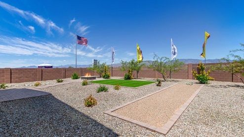 Discover the new homes at Hanson Ridge, a peaceful D.R. Horton community located in the scenic town of Vail, Arizona. Tucked away from the hustle and bustle of city life, Hanson Ridge offers a serene lifestyle with incredible desert landscapes and mountain views, while still providing easy access to I-10, making commutes to Tucson and surrounding areas convenient. Whether you’re seeking tranquility or proximity to modern conveniences, Hanson Ridge delivers the best of both worlds. This thoughtfully planned community features a variety of spacious one- and two-story homes, ranging from 1,300 to 2,500 square feet, designed to accommodate diverse lifestyles. Each home at Hanson Ridge is equipped with high-quality features, including granite countertops in the kitchens and bathrooms, 42" shaker-style cabinets, and beautiful 18"x18" tile flooring. The homes also feature covered front porches and back patios, providing the perfect spaces to enjoy Arizona’s beautiful weather. The community is designed with spacious lots, and generous pool-ready backyards, giving you the flexibility to customize your own outdoor oasis. Hanson Ridge is built with energy efficiency in mind, meeting the DOE Zero Energy Ready Home standards. These high-performance homes are so energy-efficient that a renewable energy system could offset most or all of the home's annual energy use. With advanced features such as a tankless water heater, energy-efficient LED lighting, a smart thermostat and more, these homes offer both comfort and sustainability. Additionally, the Home is Connected® Smart Home package built into every home includes a video doorbell, keyless entry, Deako smart switches a Wi-Fi-enabled garage door opener and more, ensuring that modern convenience is at your fingertips whether you're at home or away. Residents of Hanson Ridge enjoy a strong sense of community, with parks, walking paths, and playgrounds sprinkled throughout the neighborhood, fostering connections among families and neighbors. The Vail Unified School District, renowned for its exceptional educational standards, serves this community, with Acacia Elementary School, Old Vail Middle School, and Cienega High School all located nearby. The location of Hanson Ridge provides residents with easy access to a variety of outdoor and recreational activities. Explore the nearby Rincon Mountains, hike through Saguaro National Park, or visit Colossal Cave Mountain Park and Cienega Creek Natural Preserve. For those who enjoy golfing, Del Lago Golf Course is just minutes away. The community’s proximity to major employers such as Raytheon, UA Tech Park, Davis-Monthan Air Force Base, and the Target Distribution Center makes it an ideal choice for working professionals. In addition to its natural beauty and recreational offerings, Hanson Ridge is just a short drive from the town center, where you’ll find shopping, dining, and entertainment options. Visit the Pima County Fairgrounds, enjoy a movie at Galaxy Theatres, or explore the historic Cienega Bridge landmark. For a weekend getaway, Sonoita’s Wine Country is just 30 minutes away, offering cooler climates, picturesque vineyards, and outdoor adventures. Hanson Ridge offers a unique blend of peaceful, rural living with the convenience of nearby urban amenities. Experience the charm and comfort of Hanson Ridge, where your new home awaits.