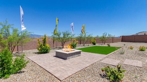 Discover the new homes at Hanson Ridge, a peaceful D.R. Horton community located in the scenic town of Vail, Arizona. Tucked away from the hustle and bustle of city life, Hanson Ridge offers a serene lifestyle with incredible desert landscapes and mountain views, while still providing easy access to I-10, making commutes to Tucson and surrounding areas convenient. Whether you’re seeking tranquility or proximity to modern conveniences, Hanson Ridge delivers the best of both worlds. This thoughtfully planned community features a variety of spacious one- and two-story homes, ranging from 1,300 to 2,500 square feet, designed to accommodate diverse lifestyles. Each home at Hanson Ridge is equipped with high-quality features, including granite countertops in the kitchens and bathrooms, 42" shaker-style cabinets, and beautiful 18"x18" tile flooring. The homes also feature covered front porches and back patios, providing the perfect spaces to enjoy Arizona’s beautiful weather. The community is designed with spacious lots, and generous pool-ready backyards, giving you the flexibility to customize your own outdoor oasis. Hanson Ridge is built with energy efficiency in mind, meeting the DOE Zero Energy Ready Home standards. These high-performance homes are so energy-efficient that a renewable energy system could offset most or all of the home's annual energy use. With advanced features such as a tankless water heater, energy-efficient LED lighting, a smart thermostat and more, these homes offer both comfort and sustainability. Additionally, the Home is Connected® Smart Home package built into every home includes a video doorbell, keyless entry, Deako smart switches a Wi-Fi-enabled garage door opener and more, ensuring that modern convenience is at your fingertips whether you're at home or away. Residents of Hanson Ridge enjoy a strong sense of community, with parks, walking paths, and playgrounds sprinkled throughout the neighborhood, fostering connections among families and neighbors. The Vail Unified School District, renowned for its exceptional educational standards, serves this community, with Acacia Elementary School, Old Vail Middle School, and Cienega High School all located nearby. The location of Hanson Ridge provides residents with easy access to a variety of outdoor and recreational activities. Explore the nearby Rincon Mountains, hike through Saguaro National Park, or visit Colossal Cave Mountain Park and Cienega Creek Natural Preserve. For those who enjoy golfing, Del Lago Golf Course is just minutes away. The community’s proximity to major employers such as Raytheon, UA Tech Park, Davis-Monthan Air Force Base, and the Target Distribution Center makes it an ideal choice for working professionals. In addition to its natural beauty and recreational offerings, Hanson Ridge is just a short drive from the town center, where you’ll find shopping, dining, and entertainment options. Visit the Pima County Fairgrounds, enjoy a movie at Galaxy Theatres, or explore the historic Cienega Bridge landmark. For a weekend getaway, Sonoita’s Wine Country is just 30 minutes away, offering cooler climates, picturesque vineyards, and outdoor adventures. Hanson Ridge offers a unique blend of peaceful, rural living with the convenience of nearby urban amenities. Experience the charm and comfort of Hanson Ridge, where your new home awaits.