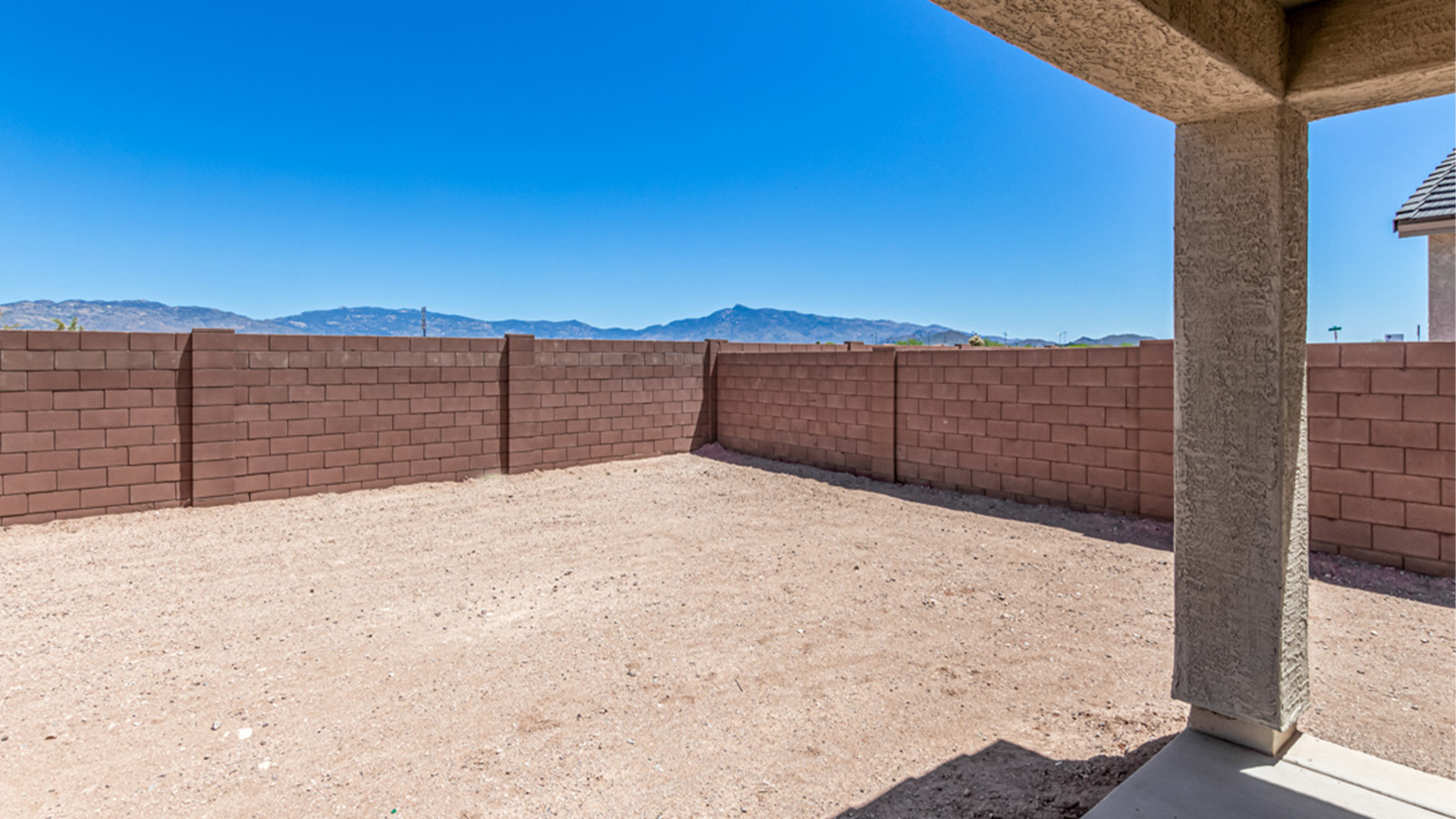 Welcome to The Amber at Hanson Ridge in Vail, Arizona – a beautifully crafted 1,331 sq. ft. single-story new home that offers modern living in a peaceful desert setting.  As you step through the inviting front porch, the thoughtfully designed entryway leads you into an open-concept living space that seamlessly connects the great room, dining area, and kitchen. This layout is ideal for both relaxing with family and entertaining guests. The kitchen, equipped with granite countertops, modern appliances, and a convenient pantry, is designed to meet your culinary needs while maintaining a stylish appeal.  The master suite, located at the rear of the home, offers a private retreat. The spacious bedroom is complemented by a large walk-in closet and an en-suite bathroom featuring dual vanities and a walk-in shower. This suite provides a serene space to unwind after a day of exploring the nearby Rincon Mountains or hiking through Saguaro National Park.  Two additional bedrooms are thoughtfully positioned to offer comfort and privacy, sharing a well-appointed full bathroom. The home also includes a utility room and direct access to a two-car garage, ensuring daily tasks are convenient and efficient.  Step outside to the covered patio, where you can enjoy Arizona’s beautiful weather and the incredible desert landscapes that Hanson Ridge has to offer. Whether you're enjoying a quiet morning coffee or hosting an evening gathering, this outdoor space is the perfect extension of your living area.  Living at Hanson Ridge means more than just having a beautiful home. The community offers a serene lifestyle with incredible mountain views and easy access to I-10 for convenient commutes to Tucson and surrounding areas. Hanson Ridge is designed with energy efficiency in mind, meeting DOE Zero Energy Ready Home standards to provide both comfort and sustainability.   Explore the charm and comfort of Hanson Ridge, where your new home awaits.