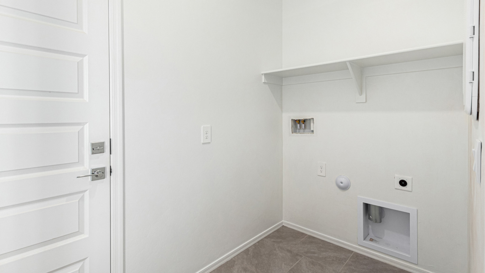 Welcome to The Amber at Hanson Ridge in Vail, Arizona – a beautifully crafted 1,331 sq. ft. single-story new home that offers modern living in a peaceful desert setting.  As you step through the inviting front porch, the thoughtfully designed entryway leads you into an open-concept living space that seamlessly connects the great room, dining area, and kitchen. This layout is ideal for both relaxing with family and entertaining guests. The kitchen, equipped with granite countertops, modern appliances, and a convenient pantry, is designed to meet your culinary needs while maintaining a stylish appeal.  The master suite, located at the rear of the home, offers a private retreat. The spacious bedroom is complemented by a large walk-in closet and an en-suite bathroom featuring dual vanities and a walk-in shower. This suite provides a serene space to unwind after a day of exploring the nearby Rincon Mountains or hiking through Saguaro National Park.  Two additional bedrooms are thoughtfully positioned to offer comfort and privacy, sharing a well-appointed full bathroom. The home also includes a utility room and direct access to a two-car garage, ensuring daily tasks are convenient and efficient.  Step outside to the covered patio, where you can enjoy Arizona’s beautiful weather and the incredible desert landscapes that Hanson Ridge has to offer. Whether you're enjoying a quiet morning coffee or hosting an evening gathering, this outdoor space is the perfect extension of your living area.  Living at Hanson Ridge means more than just having a beautiful home. The community offers a serene lifestyle with incredible mountain views and easy access to I-10 for convenient commutes to Tucson and surrounding areas. Hanson Ridge is designed with energy efficiency in mind, meeting DOE Zero Energy Ready Home standards to provide both comfort and sustainability.   Explore the charm and comfort of Hanson Ridge, where your new home awaits.