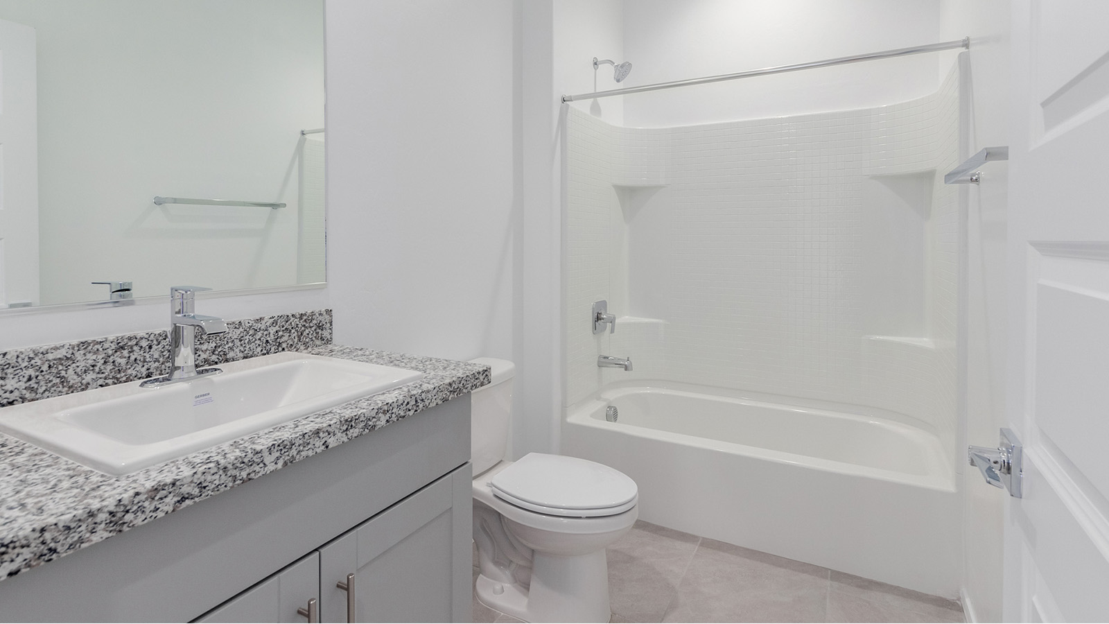 Step into The Diana at Hanson Ridge in Vail, Arizona – a thoughtfully crafted 1,558 sq. ft. single-story new home designed to offer a perfect harmony of comfort and desert elegance.  As you enter through the inviting front porch, you're welcomed into a bright and airy living space that flows seamlessly into the great room, dining area, and kitchen. This open-concept design is perfect for both casual family living and entertaining. The kitchen, with its granite countertops, modern appliances, and a convenient pantry, is both stylish and functional, making meal preparation a breeze.  The master suite, located at the rear of the home, provides a private retreat with a spacious bedroom, a large walk-in closet, and an en-suite bathroom featuring dual vanities and a walk-in shower. This suite offers a peaceful escape, ideal for relaxation after a day of enjoying the natural beauty surrounding Hanson Ridge.  Two additional bedrooms are thoughtfully placed to provide privacy and comfort, sharing a well-appointed full bathroom. The home also includes a utility room for added convenience and direct access to a two-car garage, making daily tasks efficient and easy.  Step outside from the great room to the covered patio, where you can enjoy Arizona’s beautiful weather year-round. Whether you're savoring a quiet morning or hosting an evening gathering, this outdoor space extends your living area into the tranquil surroundings of Hanson Ridge.  Living at Hanson Ridge means more than just having a beautiful home. The community offers a peaceful lifestyle with incredible desert landscapes, mountain views, and easy access to I-10 for convenient commutes to Tucson and surrounding areas. Designed with energy efficiency in mind, The Diana at Hanson Ridge meets DOE Zero Energy Ready Home standards, ensuring sustainability and long-term savings.  Experience the charm and comfort of The Diana at Hanson Ridge, where modern convenience meets the beauty of Arizona’s desert landscape.