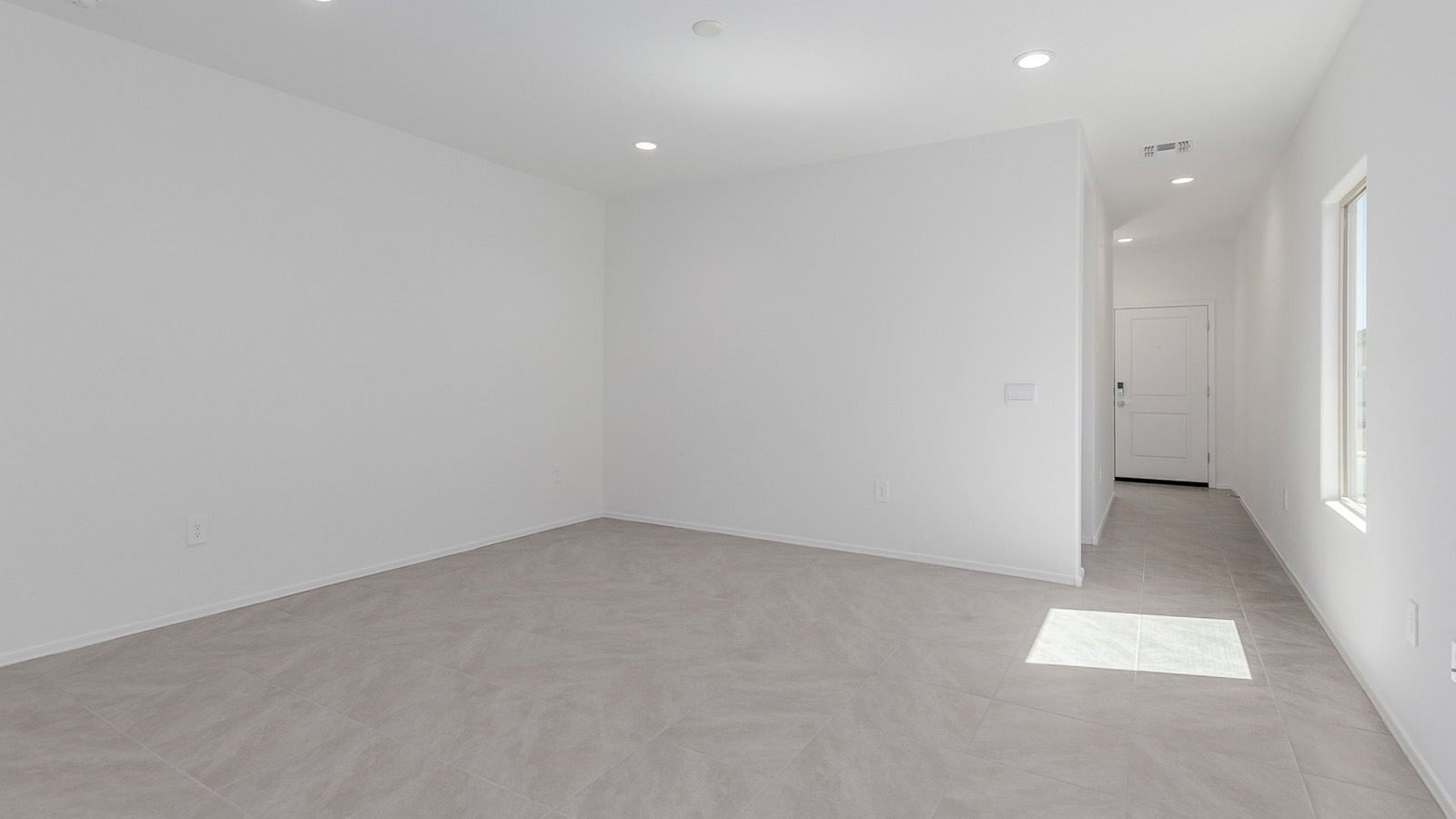 Step into The Diana at Hanson Ridge in Vail, Arizona – a thoughtfully crafted 1,558 sq. ft. single-story new home designed to offer a perfect harmony of comfort and desert elegance.  As you enter through the inviting front porch, you're welcomed into a bright and airy living space that flows seamlessly into the great room, dining area, and kitchen. This open-concept design is perfect for both casual family living and entertaining. The kitchen, with its granite countertops, modern appliances, and a convenient pantry, is both stylish and functional, making meal preparation a breeze.  The master suite, located at the rear of the home, provides a private retreat with a spacious bedroom, a large walk-in closet, and an en-suite bathroom featuring dual vanities and a walk-in shower. This suite offers a peaceful escape, ideal for relaxation after a day of enjoying the natural beauty surrounding Hanson Ridge.  Two additional bedrooms are thoughtfully placed to provide privacy and comfort, sharing a well-appointed full bathroom. The home also includes a utility room for added convenience and direct access to a two-car garage, making daily tasks efficient and easy.  Step outside from the great room to the covered patio, where you can enjoy Arizona’s beautiful weather year-round. Whether you're savoring a quiet morning or hosting an evening gathering, this outdoor space extends your living area into the tranquil surroundings of Hanson Ridge.  Living at Hanson Ridge means more than just having a beautiful home. The community offers a peaceful lifestyle with incredible desert landscapes, mountain views, and easy access to I-10 for convenient commutes to Tucson and surrounding areas. Designed with energy efficiency in mind, The Diana at Hanson Ridge meets DOE Zero Energy Ready Home standards, ensuring sustainability and long-term savings.  Experience the charm and comfort of The Diana at Hanson Ridge, where modern convenience meets the beauty of Arizona’s desert landscape.  *Images shown are for reference only. They depict the Diana model home and may not represent the actual home.