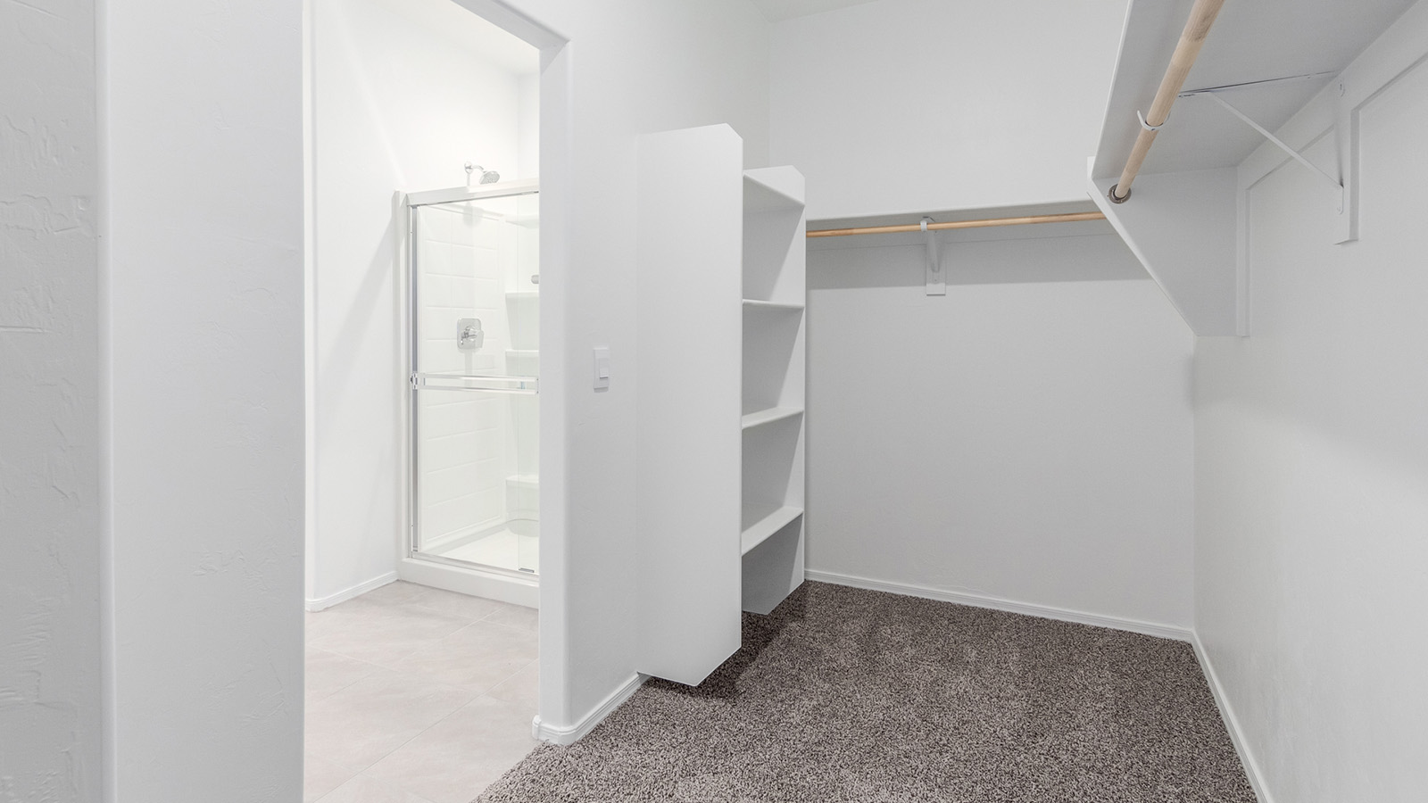 Step into The Diana at Hanson Ridge in Vail, Arizona – a thoughtfully crafted 1,558 sq. ft. single-story new home designed to offer a perfect harmony of comfort and desert elegance.  As you enter through the inviting front porch, you're welcomed into a bright and airy living space that flows seamlessly into the great room, dining area, and kitchen. This open-concept design is perfect for both casual family living and entertaining. The kitchen, with its granite countertops, modern appliances, and a convenient pantry, is both stylish and functional, making meal preparation a breeze.  The master suite, located at the rear of the home, provides a private retreat with a spacious bedroom, a large walk-in closet, and an en-suite bathroom featuring dual vanities and a walk-in shower. This suite offers a peaceful escape, ideal for relaxation after a day of enjoying the natural beauty surrounding Hanson Ridge.  Two additional bedrooms are thoughtfully placed to provide privacy and comfort, sharing a well-appointed full bathroom. The home also includes a utility room for added convenience and direct access to a two-car garage, making daily tasks efficient and easy.  Step outside from the great room to the covered patio, where you can enjoy Arizona’s beautiful weather year-round. Whether you're savoring a quiet morning or hosting an evening gathering, this outdoor space extends your living area into the tranquil surroundings of Hanson Ridge.  Living at Hanson Ridge means more than just having a beautiful home. The community offers a peaceful lifestyle with incredible desert landscapes, mountain views, and easy access to I-10 for convenient commutes to Tucson and surrounding areas. Designed with energy efficiency in mind, The Diana at Hanson Ridge meets DOE Zero Energy Ready Home standards, ensuring sustainability and long-term savings.  Experience the charm and comfort of The Diana at Hanson Ridge, where modern convenience meets the beauty of Arizona’s desert landscape.