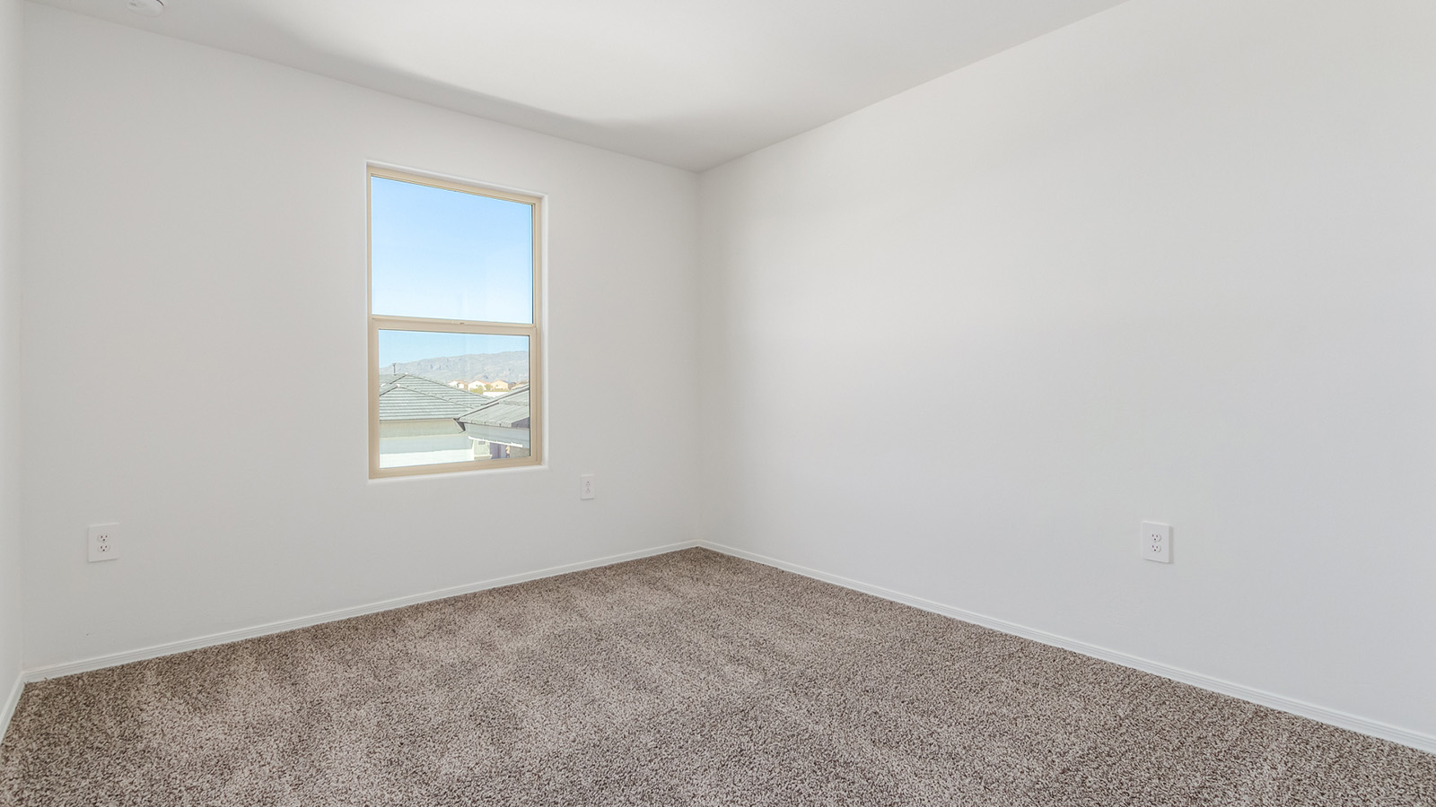 Introducing The Grace at Hanson Ridge in Vail, Arizona – a stunning 1,963 sq. ft. two-story new home designed to bring a blend of comfort, style, and functionality to your everyday life.  As you enter this spacious home through the welcoming front porch, you’re greeted by an entryway that leads into an expansive great room. The open-concept main floor seamlessly connects the great room to the dining area and kitchen, creating an inviting space perfect for family gatherings and entertaining guests. The kitchen is a true centerpiece, featuring granite countertops, modern appliances, and a large walk-in pantry, ensuring both style and practicality.  The main floor also includes a convenient powder room and direct access to a two-car garage, adding to the home's functionality. Just off the kitchen and dining room, the covered patio invites you to enjoy Arizona’s beautiful weather year-round, providing a perfect spot for outdoor dining or relaxing in the serene desert surroundings.  Upstairs, the master suite offers a tranquil get-away with a spacious bedroom, a large walk-in closet, and an en-suite bathroom featuring dual vanities and a walk-in shower. The upper level also includes three additional bedrooms, each with its own walk-in closet, ensuring ample storage space for the entire family. A full bathroom, a centrally located utility room, and a versatile loft area that can be adapted to suit your family’s needs complete the upstairs living quarters.  Living at Hanson Ridge offers the best of both worlds – a peaceful, scenic environment with easy access to the conveniences of Tucson. The community is designed to foster a strong sense of connection among neighbors, with parks, walking paths, and playgrounds woven throughout. Plus, Hanson Ridge homes, including The Grace, are built to DOE Zero Energy Ready Home standards, ensuring energy efficiency and sustainability for years to come.  Come experience The Grace at Hanson Ridge, where modern living meets the beauty of Arizona’s desert landscape.