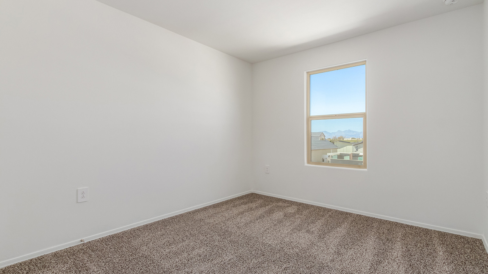 Introducing The Grace at Hanson Ridge in Vail, Arizona – a stunning 1,963 sq. ft. two-story new home designed to bring a blend of comfort, style, and functionality to your everyday life.  As you enter this spacious home through the welcoming front porch, you’re greeted by an entryway that leads into an expansive great room. The open-concept main floor seamlessly connects the great room to the dining area and kitchen, creating an inviting space perfect for family gatherings and entertaining guests. The kitchen is a true centerpiece, featuring granite countertops, modern appliances, and a large walk-in pantry, ensuring both style and practicality.  The main floor also includes a convenient powder room and direct access to a two-car garage, adding to the home's functionality. Just off the kitchen and dining room, the covered patio invites you to enjoy Arizona’s beautiful weather year-round, providing a perfect spot for outdoor dining or relaxing in the serene desert surroundings.  Upstairs, the master suite offers a tranquil get-away with a spacious bedroom, a large walk-in closet, and an en-suite bathroom featuring dual vanities and a walk-in shower. The upper level also includes three additional bedrooms, each with its own walk-in closet, ensuring ample storage space for the entire family. A full bathroom, a centrally located utility room, and a versatile loft area that can be adapted to suit your family’s needs complete the upstairs living quarters.  Living at Hanson Ridge offers the best of both worlds – a peaceful, scenic environment with easy access to the conveniences of Tucson. The community is designed to foster a strong sense of connection among neighbors, with parks, walking paths, and playgrounds woven throughout. Plus, Hanson Ridge homes, including The Grace, are built to DOE Zero Energy Ready Home standards, ensuring energy efficiency and sustainability for years to come.  Come experience The Grace at Hanson Ridge, where modern living meets the beauty of Arizona’s desert landscape.