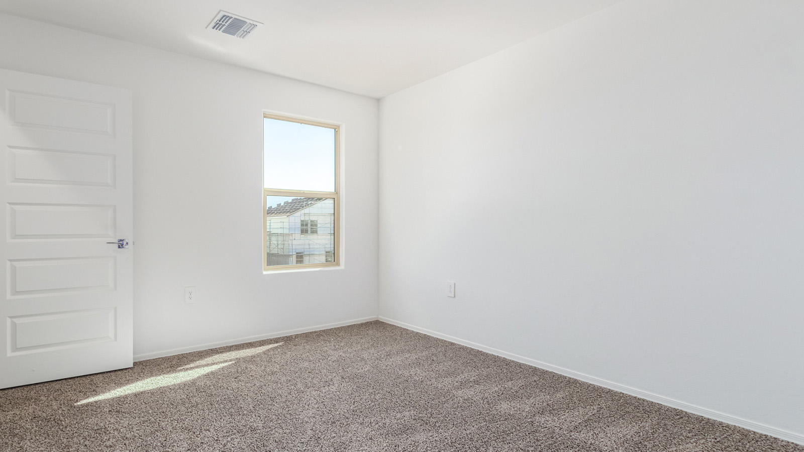 Introducing The Grace at Hanson Ridge in Vail, Arizona – a stunning 1,963 sq. ft. two-story new home designed to bring a blend of comfort, style, and functionality to your everyday life.  As you enter this spacious home through the welcoming front porch, you’re greeted by an entryway that leads into an expansive great room. The open-concept main floor seamlessly connects the great room to the dining area and kitchen, creating an inviting space perfect for family gatherings and entertaining guests. The kitchen is a true centerpiece, featuring granite countertops, modern appliances, and a large walk-in pantry, ensuring both style and practicality.  The main floor also includes a convenient powder room and direct access to a two-car garage, adding to the home's functionality. Just off the kitchen and dining room, the covered patio invites you to enjoy Arizona’s beautiful weather year-round, providing a perfect spot for outdoor dining or relaxing in the serene desert surroundings.  Upstairs, the master suite offers a tranquil get-away with a spacious bedroom, a large walk-in closet, and an en-suite bathroom featuring dual vanities and a walk-in shower. The upper level also includes three additional bedrooms, each with its own walk-in closet, ensuring ample storage space for the entire family. A full bathroom, a centrally located utility room, and a versatile loft area that can be adapted to suit your family’s needs complete the upstairs living quarters.  Living at Hanson Ridge offers the best of both worlds – a peaceful, scenic environment with easy access to the conveniences of Tucson. The community is designed to foster a strong sense of connection among neighbors, with parks, walking paths, and playgrounds woven throughout. Plus, Hanson Ridge homes, including The Grace, are built to DOE Zero Energy Ready Home standards, ensuring energy efficiency and sustainability for years to come.  Come experience The Grace at Hanson Ridge, where modern living meets the beauty of Arizona’s desert landscape.