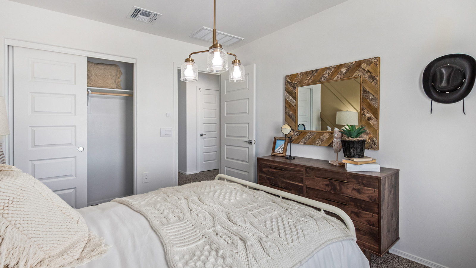 Discover The Kate at Hanson Ridge in Vail, Arizona – a beautifully designed 2,264 sq. ft. two-story floor plan that seamlessly blends functionality with style, offering a perfect retreat within the stunning desert landscape.  As you step through the front porch, you're greeted by a spacious entryway that leads directly into the heart of the home. The main floor is laid out to accommodate both everyday living and special occasions. The expansive great room opens into the dining area and the kitchen, creating a central hub for gatherings. The kitchen features quartz countertops, modern appliances, and a large walk-in pantry.  The covered patio is just off the dining area extends your living space outdoors, perfect for enjoying the beautiful Arizona weather year-round.  Upstairs, The Kate offers a private sanctuary with four well-appointed bedrooms. The primary suite is a true sanctuary, featuring a spacious bedroom, a large walk-in closet, and an en-suite bathroom. The upper level also includes three additional bedrooms, each with ample closet space, and a full bathroom conveniently located near the laundry room. A versatile loft provides additional space for relaxation, hobbies, or work, making this home ideal for growing families.  Living at Hanson Ridge means enjoying the best of both worlds – a peaceful, scenic environment with easy access to modern conveniences. The community offers parks, walking paths, and playgrounds, making it a perfect setting for families. Hanson Ridge homes, including The Kate, are built with energy efficiency in mind, meeting DOE Zero Energy Ready Home standards. This means you can enjoy a sustainable lifestyle with lower utility costs, featuring advanced energy-saving technologies and smart home features.  *Images shown are for reference only. They depict the Kate model and may not represent the actual home.