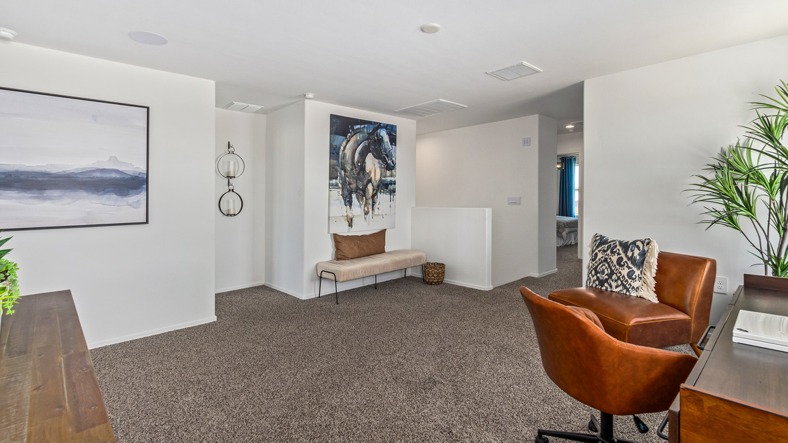 Discover The Kate at Hanson Ridge in Vail, Arizona – a beautifully designed 2,264 sq. ft. two-story floor plan that seamlessly blends functionality with style, offering a perfect retreat within the stunning desert landscape.  As you step through the front porch, you're greeted by a spacious entryway that leads directly into the heart of the home. The main floor is laid out to accommodate both everyday living and special occasions. The expansive great room opens into the dining area and the kitchen, creating a central hub for gatherings. The kitchen features quartz countertops, modern appliances, and a large walk-in pantry.  The covered patio is just off the dining area extends your living space outdoors, perfect for enjoying the beautiful Arizona weather year-round.  Upstairs, The Kate offers a private sanctuary with four well-appointed bedrooms. The primary suite is a true sanctuary, featuring a spacious bedroom, a large walk-in closet, and an en-suite bathroom. The upper level also includes three additional bedrooms, each with ample closet space, and a full bathroom conveniently located near the laundry room. A versatile loft provides additional space for relaxation, hobbies, or work, making this home ideal for growing families.  Living at Hanson Ridge means enjoying the best of both worlds – a peaceful, scenic environment with easy access to modern conveniences. The community offers parks, walking paths, and playgrounds, making it a perfect setting for families. Hanson Ridge homes, including The Kate, are built with energy efficiency in mind, meeting DOE Zero Energy Ready Home standards. This means you can enjoy a sustainable lifestyle with lower utility costs, featuring advanced energy-saving technologies and smart home features.  *Images shown are for reference only. They depict the Kate model and may not represent the actual home.