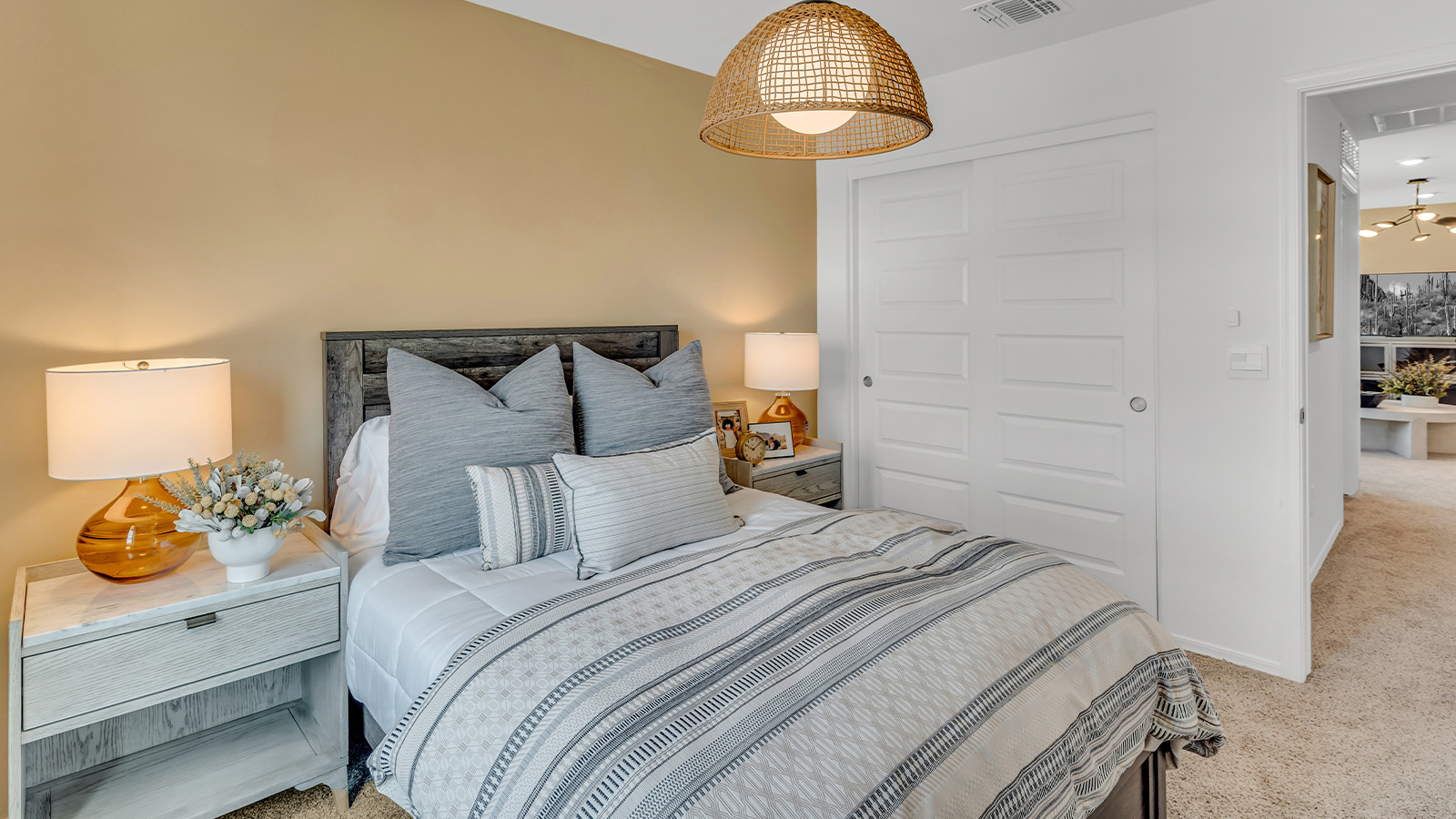 Discover The Kate at Hanson Ridge in Vail, Arizona – a beautifully designed 2,264 sq. ft. two-story floor plan that seamlessly blends functionality with style, offering a perfect retreat within the stunning desert landscape.  As you step through the front porch, you're greeted by a spacious entryway that leads directly into the heart of the home. The main floor is laid out to accommodate both everyday living and special occasions. The expansive great room opens into the dining area and the kitchen, creating a central hub for gatherings. The kitchen features quartz countertops, modern appliances, and a large walk-in pantry.  The covered patio is just off the dining area extends your living space outdoors, perfect for enjoying the beautiful Arizona weather year-round.  Upstairs, The Kate offers a private sanctuary with four well-appointed bedrooms. The primary suite is a true sanctuary, featuring a spacious bedroom, a large walk-in closet, and an en-suite bathroom. The upper level also includes three additional bedrooms, each with ample closet space, and a full bathroom conveniently located near the laundry room. A versatile loft provides additional space for relaxation, hobbies, or work, making this home ideal for growing families.  Living at Hanson Ridge means enjoying the best of both worlds – a peaceful, scenic environment with easy access to modern conveniences. The community offers parks, walking paths, and playgrounds, making it a perfect setting for families. Hanson Ridge homes, including The Kate, are built with energy efficiency in mind, meeting DOE Zero Energy Ready Home standards. This means you can enjoy a sustainable lifestyle with lower utility costs, featuring advanced energy-saving technologies and smart home features.  *Images shown are for reference only. They depict the Kate model and may not represent the actual home.