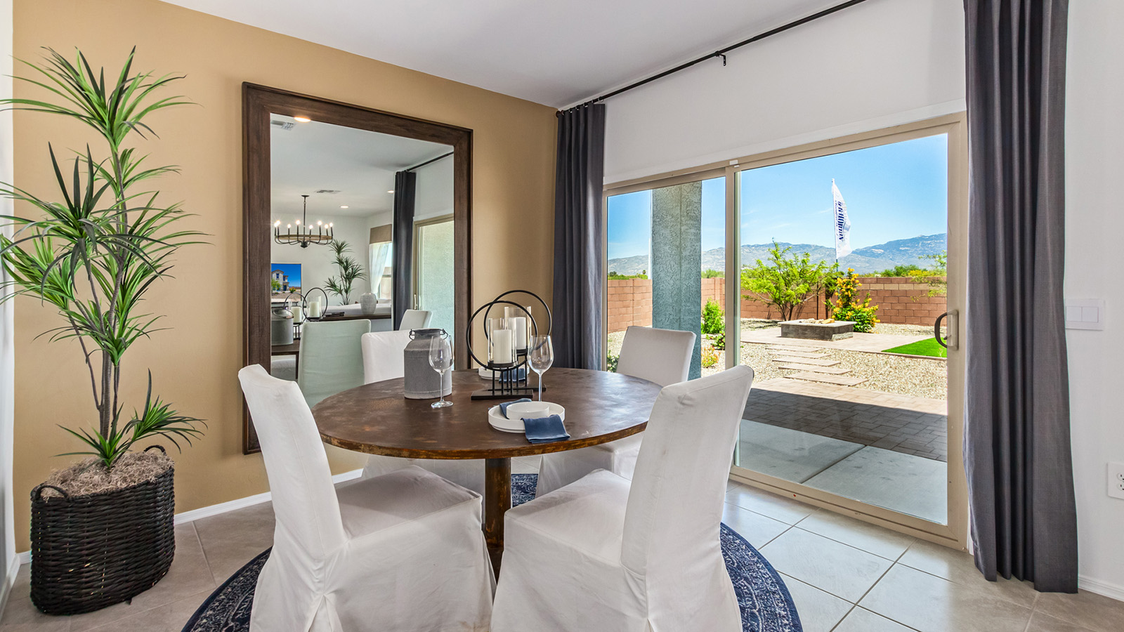 Discover The Kate at Hanson Ridge in Vail, Arizona – a beautifully designed 2,264 sq. ft. two-story floor plan that seamlessly blends functionality with style, offering a perfect retreat within the stunning desert landscape.  As you step through the front porch, you're greeted by a spacious entryway that leads directly into the heart of the home. The main floor is laid out to accommodate both everyday living and special occasions. The expansive great room opens into the dining area and the kitchen, creating a central hub for gatherings. The kitchen features quartz countertops, modern appliances, and a large walk-in pantry.  The covered patio is just off the dining area extends your living space outdoors, perfect for enjoying the beautiful Arizona weather year-round.  Upstairs, The Kate offers a private sanctuary with four well-appointed bedrooms. The primary suite is a true sanctuary, featuring a spacious bedroom, a large walk-in closet, and an en-suite bathroom. The upper level also includes three additional bedrooms, each with ample closet space, and a full bathroom conveniently located near the laundry room. A versatile loft provides additional space for relaxation, hobbies, or work, making this home ideal for growing families.  Living at Hanson Ridge means enjoying the best of both worlds – a peaceful, scenic environment with easy access to modern conveniences. The community offers parks, walking paths, and playgrounds, making it a perfect setting for families. Hanson Ridge homes, including The Kate, are built with energy efficiency in mind, meeting DOE Zero Energy Ready Home standards. This means you can enjoy a sustainable lifestyle with lower utility costs, featuring advanced energy-saving technologies and smart home features.  *Images shown are for reference only. They depict The Kate model and may not represent the actual home.