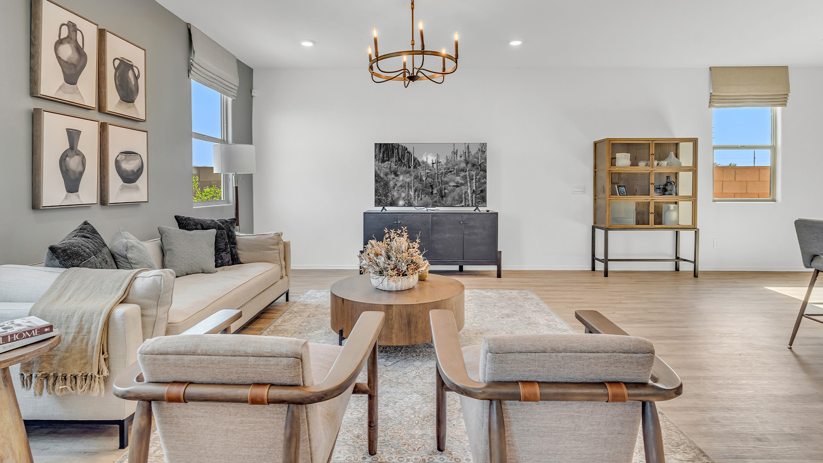 Discover The Kate at Hanson Ridge in Vail, Arizona – a beautifully designed 2,264 sq. ft. two-story floor plan that seamlessly blends functionality with style, offering a perfect retreat within the stunning desert landscape.  As you step through the front porch, you're greeted by a spacious entryway that leads directly into the heart of the home. The main floor is laid out to accommodate both everyday living and special occasions. The expansive great room opens into the dining area and the kitchen, creating a central hub for gatherings. The kitchen features quartz countertops, modern appliances, and a large walk-in pantry.  The covered patio is just off the dining area extends your living space outdoors, perfect for enjoying the beautiful Arizona weather year-round.  Upstairs, The Kate offers a private sanctuary with four well-appointed bedrooms. The primary suite is a true sanctuary, featuring a spacious bedroom, a large walk-in closet, and an en-suite bathroom. The upper level also includes three additional bedrooms, each with ample closet space, and a full bathroom conveniently located near the laundry room. A versatile loft provides additional space for relaxation, hobbies, or work, making this home ideal for growing families.  Living at Hanson Ridge means enjoying the best of both worlds – a peaceful, scenic environment with easy access to modern conveniences. The community offers parks, walking paths, and playgrounds, making it a perfect setting for families. Hanson Ridge homes, including The Kate, are built with energy efficiency in mind, meeting DOE Zero Energy Ready Home standards. This means you can enjoy a sustainable lifestyle with lower utility costs, featuring advanced energy-saving technologies and smart home features.  *Images shown are for reference only. They depict the Kate model and may not represent the actual home.