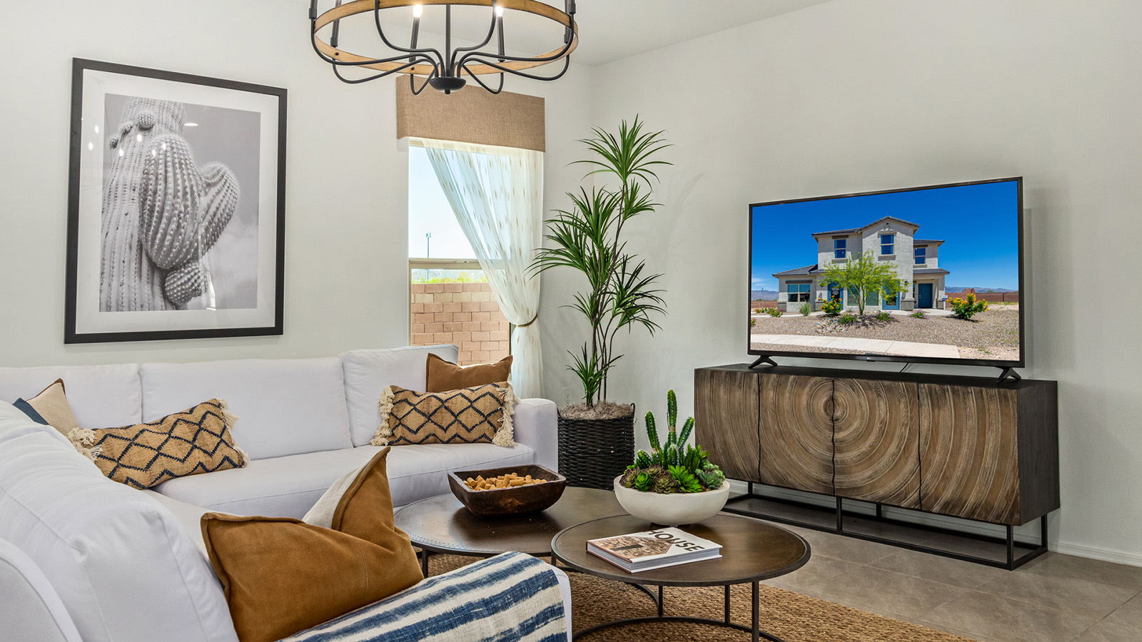 Discover The Kate at Hanson Ridge in Vail, Arizona – a beautifully designed 2,264 sq. ft. two-story floor plan that seamlessly blends functionality with style, offering a perfect retreat within the stunning desert landscape.  As you step through the front porch, you're greeted by a spacious entryway that leads directly into the heart of the home. The main floor is laid out to accommodate both everyday living and special occasions. The expansive great room opens into the dining area and the kitchen, creating a central hub for gatherings. The kitchen features quartz countertops, modern appliances, and a large walk-in pantry.  The covered patio is just off the dining area extends your living space outdoors, perfect for enjoying the beautiful Arizona weather year-round.  Upstairs, The Kate offers a private sanctuary with four well-appointed bedrooms. The primary suite is a true sanctuary, featuring a spacious bedroom, a large walk-in closet, and an en-suite bathroom. The upper level also includes three additional bedrooms, each with ample closet space, and a full bathroom conveniently located near the laundry room. A versatile loft provides additional space for relaxation, hobbies, or work, making this home ideal for growing families.  Living at Hanson Ridge means enjoying the best of both worlds – a peaceful, scenic environment with easy access to modern conveniences. The community offers parks, walking paths, and playgrounds, making it a perfect setting for families. Hanson Ridge homes, including The Kate, are built with energy efficiency in mind, meeting DOE Zero Energy Ready Home standards. This means you can enjoy a sustainable lifestyle with lower utility costs, featuring advanced energy-saving technologies and smart home features.  *Images shown are for reference only. They depict the Kate model and may not represent the actual home.