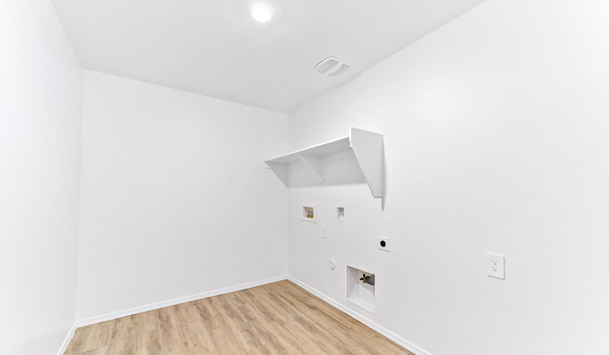 Welcome to The Madison at Hanson Ridge in Vail, Arizona – a beautifully designed 2,522 sq. ft. two-story floor plan designed for families seeking both luxury and functionality.  As you step through the inviting front porch, you're greeted by a thoughtfully designed entryway that leads into the heart of the home. The main level features a spacious great room that flows effortlessly into the dining area and the kitchen, making it an ideal space for entertaining and family gatherings. The kitchen is equipped with elegant quartz countertops, a large central island with a breakfast bar, modern appliances, and a pantry that provides ample storage, ensuring that the kitchen is as functional as it is stylish.  The main floor also includes a bedroom with easy access to a full bathroom, making it a perfect guest suite or a private home office. The convenient bathroom and direct access to the two-car garage enhance the home’s functionality, while the nearby utility room adds a layer of practicality to daily living.  Heading upstairs, you’ll find the family’s private quarters. The primary suite is a true retreat, featuring a generously sized bedroom, a large walk-in closet, and an en-suite bathroom. The upper level also includes three additional bedrooms, a full bathroom, and a versatile loft area that can be tailored to fit your lifestyle, whether as a playroom, home office, or additional living space.  Back downstairs, step outside from the great room to the covered patio, where you can enjoy Tucson’s stunning weather year-round. Whether you’re hosting an outdoor gathering or simply relaxing after a long day, this space extends your living area and enhances the home’s inviting ambiance.  Designed with energy efficiency in mind, The Madison at Hanson Ridge is a DOE Zero Energy Ready Home, ensuring sustainability, comfort, and long-term savings.