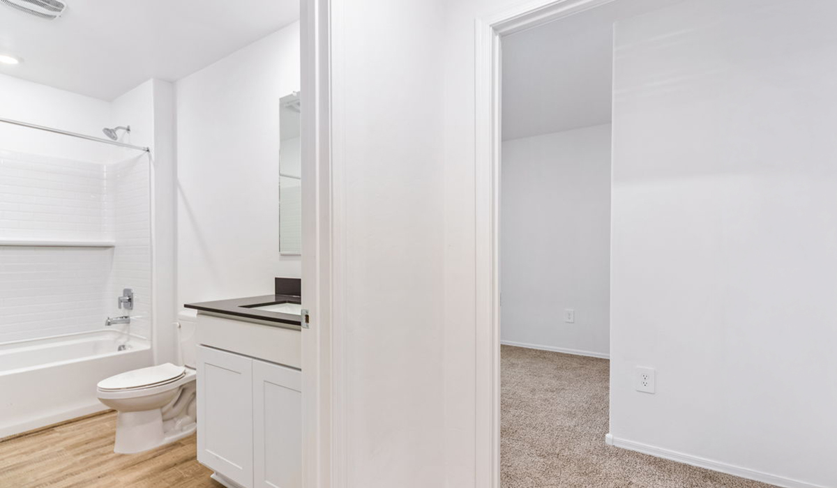 Welcome to The Madison at Hanson Ridge in Vail, Arizona – a beautifully designed 2,522 sq. ft. two-story floor plan designed for families seeking both luxury and functionality.  As you step through the inviting front porch, you're greeted by a thoughtfully designed entryway that leads into the heart of the home. The main level features a spacious great room that flows effortlessly into the dining area and the kitchen, making it an ideal space for entertaining and family gatherings. The kitchen is equipped with elegant quartz countertops, a large central island with a breakfast bar, modern appliances, and a pantry that provides ample storage, ensuring that the kitchen is as functional as it is stylish.  The main floor also includes a bedroom with easy access to a full bathroom, making it a perfect guest suite or a private home office. The convenient bathroom and direct access to the two-car garage enhance the home’s functionality, while the nearby utility room adds a layer of practicality to daily living.  Heading upstairs, you’ll find the family’s private quarters. The primary suite is a true retreat, featuring a generously sized bedroom, a large walk-in closet, and an en-suite bathroom. The upper level also includes three additional bedrooms, a full bathroom, and a versatile loft area that can be tailored to fit your lifestyle, whether as a playroom, home office, or additional living space.  Back downstairs, step outside from the great room to the covered patio, where you can enjoy Tucson’s stunning weather year-round. Whether you’re hosting an outdoor gathering or simply relaxing after a long day, this space extends your living area and enhances the home’s inviting ambiance.  Designed with energy efficiency in mind, The Madison at Hanson Ridge is a DOE Zero Energy Ready Home, ensuring sustainability, comfort, and long-term savings.