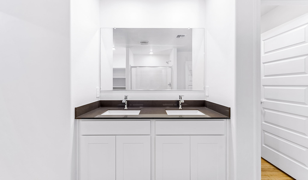 Welcome to The Madison at Hanson Ridge in Vail, Arizona – a beautifully designed 2,522 sq. ft. two-story floor plan designed for families seeking both luxury and functionality.  As you step through the inviting front porch, you're greeted by a thoughtfully designed entryway that leads into the heart of the home. The main level features a spacious great room that flows effortlessly into the dining area and the kitchen, making it an ideal space for entertaining and family gatherings. The kitchen is equipped with elegant quartz countertops, a large central island with a breakfast bar, modern appliances, and a pantry that provides ample storage, ensuring that the kitchen is as functional as it is stylish.  The main floor also includes a bedroom with easy access to a full bathroom, making it a perfect guest suite or a private home office. The convenient bathroom and direct access to the two-car garage enhance the home’s functionality, while the nearby utility room adds a layer of practicality to daily living.  Heading upstairs, you’ll find the family’s private quarters. The primary suite is a true retreat, featuring a generously sized bedroom, a large walk-in closet, and an en-suite bathroom. The upper level also includes three additional bedrooms, a full bathroom, and a versatile loft area that can be tailored to fit your lifestyle, whether as a playroom, home office, or additional living space.  Back downstairs, step outside from the great room to the covered patio, where you can enjoy Tucson’s stunning weather year-round. Whether you’re hosting an outdoor gathering or simply relaxing after a long day, this space extends your living area and enhances the home’s inviting ambiance.  Designed with energy efficiency in mind, The Madison at Hanson Ridge is a DOE Zero Energy Ready Home, ensuring sustainability, comfort, and long-term savings.