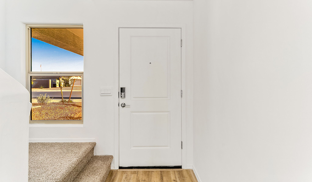 Welcome to The Madison at Hanson Ridge in Vail, Arizona – a beautifully designed 2,522 sq. ft. two-story floor plan designed for families seeking both luxury and functionality.  As you step through the inviting front porch, you're greeted by a thoughtfully designed entryway that leads into the heart of the home. The main level features a spacious great room that flows effortlessly into the dining area and the kitchen, making it an ideal space for entertaining and family gatherings. The kitchen is equipped with elegant quartz countertops, a large central island with a breakfast bar, modern appliances, and a pantry that provides ample storage, ensuring that the kitchen is as functional as it is stylish.  The main floor also includes a bedroom with easy access to a full bathroom, making it a perfect guest suite or a private home office. The convenient bathroom and direct access to the two-car garage enhance the home’s functionality, while the nearby utility room adds a layer of practicality to daily living.  Heading upstairs, you’ll find the family’s private quarters. The primary suite is a true retreat, featuring a generously sized bedroom, a large walk-in closet, and an en-suite bathroom. The upper level also includes three additional bedrooms, a full bathroom, and a versatile loft area that can be tailored to fit your lifestyle, whether as a playroom, home office, or additional living space.  Back downstairs, step outside from the great room to the covered patio, where you can enjoy Tucson’s stunning weather year-round. Whether you’re hosting an outdoor gathering or simply relaxing after a long day, this space extends your living area and enhances the home’s inviting ambiance.  Designed with energy efficiency in mind, The Madison at Hanson Ridge is a DOE Zero Energy Ready Home, ensuring sustainability, comfort, and long-term savings.