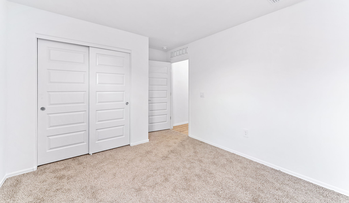 Welcome to The Madison at Hanson Ridge in Vail, Arizona – a beautifully designed 2,522 sq. ft. two-story floor plan designed for families seeking both luxury and functionality.  As you step through the inviting front porch, you're greeted by a thoughtfully designed entryway that leads into the heart of the home. The main level features a spacious great room that flows effortlessly into the dining area and the kitchen, making it an ideal space for entertaining and family gatherings. The kitchen is equipped with elegant quartz countertops, a large central island with a breakfast bar, modern appliances, and a pantry that provides ample storage, ensuring that the kitchen is as functional as it is stylish.  The main floor also includes a bedroom with easy access to a full bathroom, making it a perfect guest suite or a private home office. The convenient bathroom and direct access to the two-car garage enhance the home’s functionality, while the nearby utility room adds a layer of practicality to daily living.  Heading upstairs, you’ll find the family’s private quarters. The primary suite is a true retreat, featuring a generously sized bedroom, a large walk-in closet, and an en-suite bathroom. The upper level also includes three additional bedrooms, a full bathroom, and a versatile loft area that can be tailored to fit your lifestyle, whether as a playroom, home office, or additional living space.  Back downstairs, step outside from the great room to the covered patio, where you can enjoy Tucson’s stunning weather year-round. Whether you’re hosting an outdoor gathering or simply relaxing after a long day, this space extends your living area and enhances the home’s inviting ambiance.  Designed with energy efficiency in mind, The Madison at Hanson Ridge is a DOE Zero Energy Ready Home, ensuring sustainability, comfort, and long-term savings.