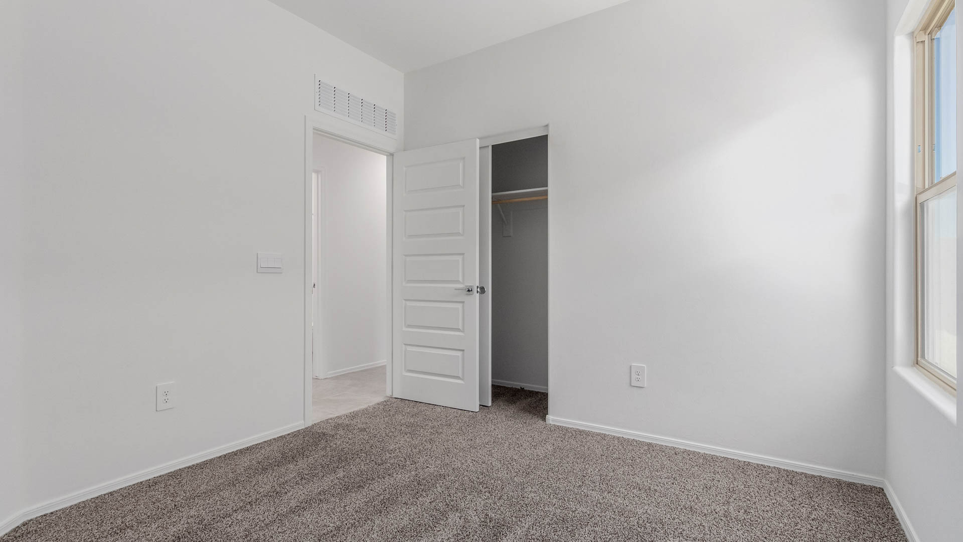 Discover the Parker at Hanson Ridge in Vail, Arizona - a beautifully designed single-story home that perfectly balances comfort and elegance. This thoughtfully crafted 1,909 square foot floor plan features five bedrooms and 3 full size bathrooms. Whether you're looking for extra space or a more open layout, the Parker is designed to suit your lifestyle with style and functionality in every detail.  As you enter through the inviting front porch, you're welcomed into a bright and airy living space that flows seamlessly into the great room, dining area, and kitchen. This open-concept design is perfect for both family gatherings and entertaining. The kitchen features Quartz countertops, Shaker Style Cabinetry, modern appliances, and a convenient pantry, making meal preparation a breeze.  The primary suite, located at the rear of the home, providing a private retreat with a spacious a large walk-in closet, and en-suite bathroom featuring dual vanities and a walk-in shower. The Parker floor plan also includes a utility room and two-car garage.  Living at Hanson Ridge means more than just having a beautiful home. The community offers a peaceful lifestyle with incredible desert landscapes, mountain views, and easy access to I-10 for convenient commutes to Tucson and surrounding areas. Designed with energy efficiency in mind, The Dalea at Hanson Ridge meets Zero Energy Ready Home standards, ensuring sustainability and long-term savings.  Experience the charm and comfort of The Parker at Hanson Ridge, where modern convenience meets the beauty of Arizona’s desert landscape.