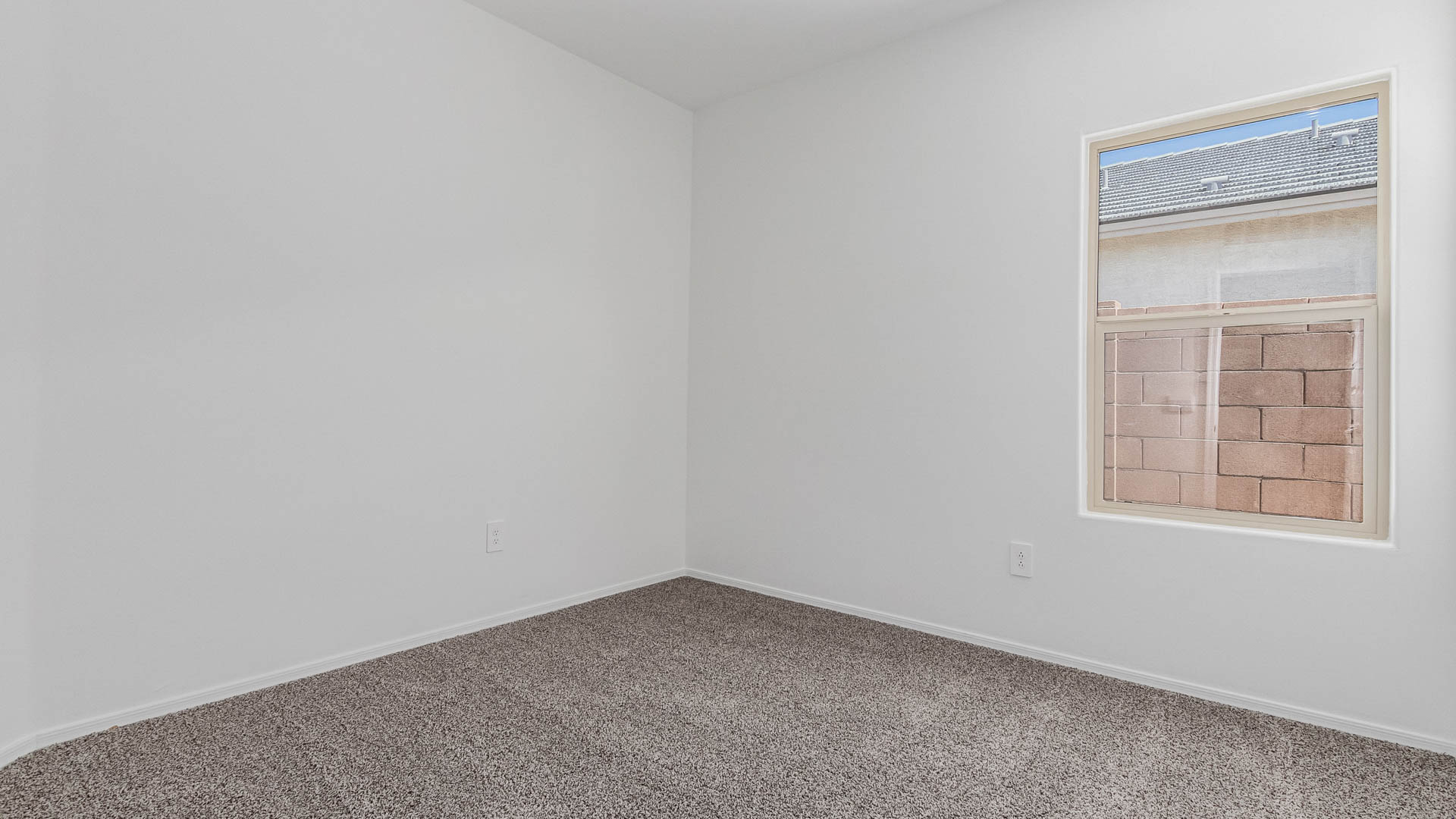 Discover the Parker at Hanson Ridge in Vail, Arizona - a beautifully designed single-story home that perfectly balances comfort and elegance. This thoughtfully crafted 1,909 square foot floor plan features five bedrooms and 3 full size bathrooms. Whether you're looking for extra space or a more open layout, the Parker is designed to suit your lifestyle with style and functionality in every detail.  As you enter through the inviting front porch, you're welcomed into a bright and airy living space that flows seamlessly into the great room, dining area, and kitchen. This open-concept design is perfect for both family gatherings and entertaining. The kitchen features Quartz countertops, Shaker Style Cabinetry, modern appliances, and a convenient pantry, making meal preparation a breeze.  The primary suite, located at the rear of the home, providing a private retreat with a spacious a large walk-in closet, and en-suite bathroom featuring dual vanities and a walk-in shower. The Parker floor plan also includes a utility room and two-car garage.  Living at Hanson Ridge means more than just having a beautiful home. The community offers a peaceful lifestyle with incredible desert landscapes, mountain views, and easy access to I-10 for convenient commutes to Tucson and surrounding areas. Designed with energy efficiency in mind, The Dalea at Hanson Ridge meets Zero Energy Ready Home standards, ensuring sustainability and long-term savings.  Experience the charm and comfort of The Parker at Hanson Ridge, where modern convenience meets the beauty of Arizona’s desert landscape.