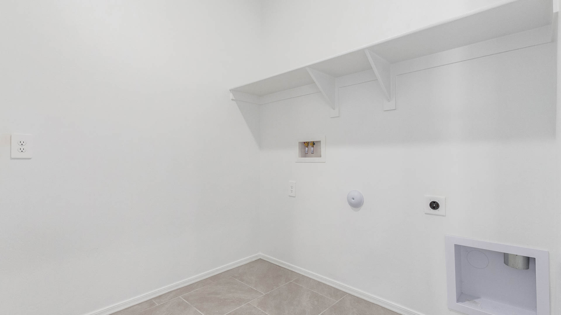 Discover the Parker at Hanson Ridge in Vail, Arizona - a beautifully designed single-story home that perfectly balances comfort and elegance. This thoughtfully crafted 1,909 square foot floor plan features five bedrooms and 3 full size bathrooms. Whether you're looking for extra space or a more open layout, the Parker is designed to suit your lifestyle with style and functionality in every detail.  As you enter through the inviting front porch, you're welcomed into a bright and airy living space that flows seamlessly into the great room, dining area, and kitchen. This open-concept design is perfect for both family gatherings and entertaining. The kitchen features Quartz countertops, Shaker Style Cabinetry, modern appliances, and a convenient pantry, making meal preparation a breeze.  The primary suite, located at the rear of the home, providing a private retreat with a spacious a large walk-in closet, and en-suite bathroom featuring dual vanities and a walk-in shower. The Parker floor plan also includes a utility room and two-car garage.  Living at Hanson Ridge means more than just having a beautiful home. The community offers a peaceful lifestyle with incredible desert landscapes, mountain views, and easy access to I-10 for convenient commutes to Tucson and surrounding areas. Designed with energy efficiency in mind, The Dalea at Hanson Ridge meets Zero Energy Ready Home standards, ensuring sustainability and long-term savings.  Experience the charm and comfort of The Parker at Hanson Ridge, where modern convenience meets the beauty of Arizona’s desert landscape.