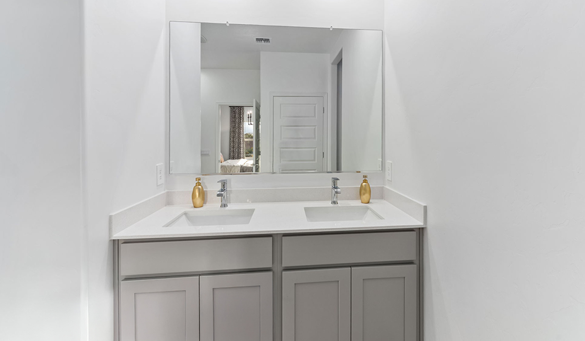 Step into The Cali at Hanson Ridge in Vail, Arizona - a thoughtfully crafted 1,823 sq. ft. single-story new home designed to offer a perfect harmony of comfort and desert elegance. As you enter through the inviting front porch, you're welcomed into a bright and airy living space that flows seamlessly into the great room, dining area, and kitchen. This open-concept design is perfect for both casual family living and entertaining. The kitchen, with its Quartz countertops, modern appliances, and a convenient pantry, is both stylish and functional, making meal preparation a breeze. The primary suite, located at the rear of the home, provides a private retreat with a spacious bedroom, a large walk-in closet, and an en-suite bathroom featuring dual vanities and a walk-in shower.  Whether you’re planning to create a dream outdoor oasis or simply enjoy the natural surroundings, this space offers endless possibilities. Built with modern living in mind, The Cali includes D.R. Horton’s Home is Connected® Smart Home package, featuring a smart thermostat, video doorbell, keyless entry, and a Wi-Fi enabled garage door opener. Energy efficiency is also a priority, with spray foam insulation and designs that meet the DOE Zero Energy Ready Home standards, ensuring long-term savings and environmental benefits.  Located within the serene Hanson Ridge community, residents of The Cali enjoy the luxury of space combined with easy access to urban amenities. Come home to The Cali, where comfort, style, and the beauty of Arizona living come together in perfect harmony.  *Images shown are for reference only. They depict the sales model home and may not represent the actual home.