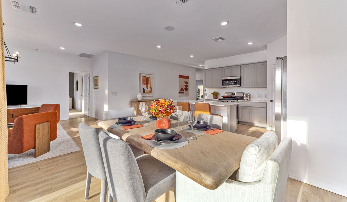 Step into The Cali at Hanson Ridge in Vail, Arizona - a thoughtfully crafted 1,823 sq. ft. single-story new home designed to offer a perfect harmony of comfort and desert elegance. As you enter through the inviting front porch, you're welcomed into a bright and airy living space that flows seamlessly into the great room, dining area, and kitchen. This open-concept design is perfect for both casual family living and entertaining. The kitchen, with its Quartz countertops, modern appliances, and a convenient pantry, is both stylish and functional, making meal preparation a breeze. The primary suite, located at the rear of the home, provides a private retreat with a spacious bedroom, a large walk-in closet, and an en-suite bathroom featuring dual vanities and a walk-in shower.  Whether you’re planning to create a dream outdoor oasis or simply enjoy the natural surroundings, this space offers endless possibilities. Built with modern living in mind, The Cali includes D.R. Horton’s Home is Connected® Smart Home package, featuring a smart thermostat, video doorbell, keyless entry, and a Wi-Fi enabled garage door opener. Energy efficiency is also a priority, with spray foam insulation and designs that meet the DOE Zero Energy Ready Home standards, ensuring long-term savings and environmental benefits.  Located within the serene Hanson Ridge community, residents of The Cali enjoy the luxury of space combined with easy access to urban amenities. Come home to The Cali, where comfort, style, and the beauty of Arizona living come together in perfect harmony.  *Images shown are for reference only. They depict the sales model home and may not represent the actual home.