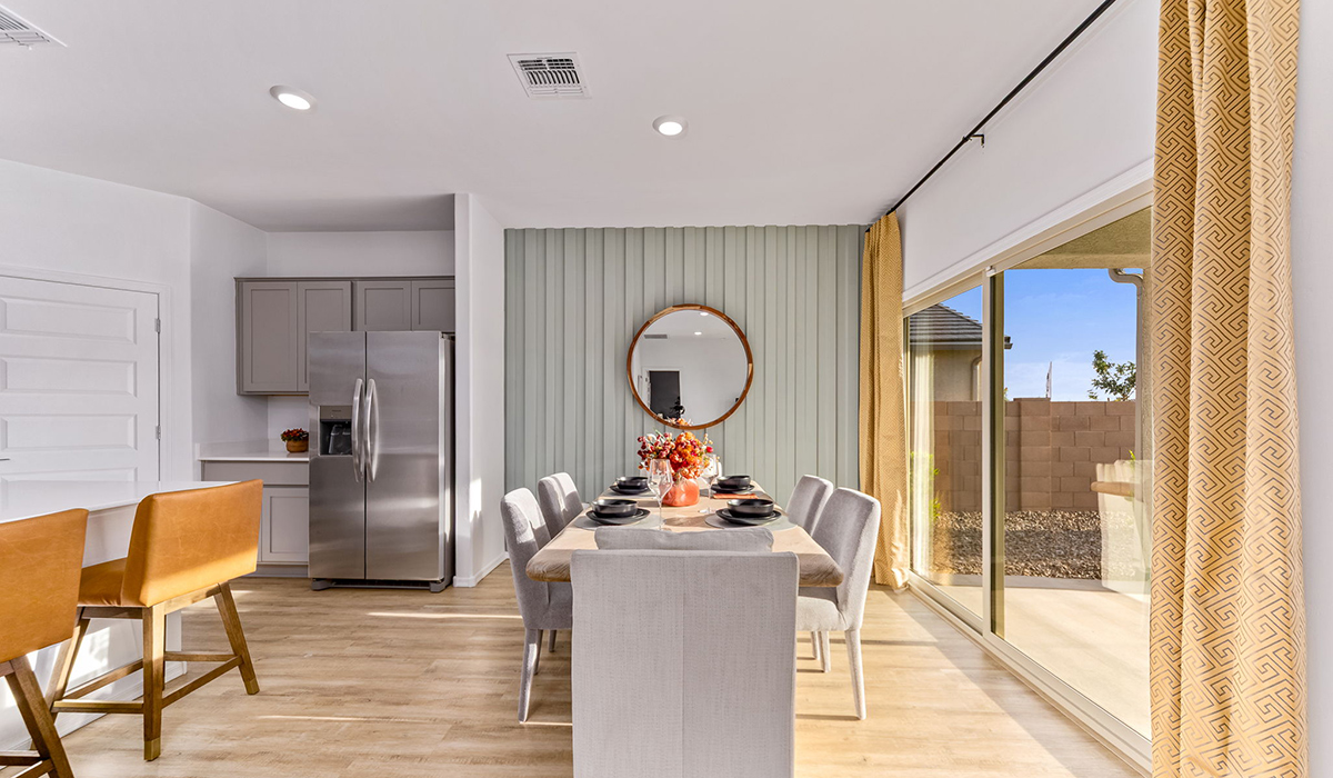 Step into The Cali at Hanson Ridge in Vail, Arizona - a thoughtfully crafted 1,823 sq. ft. single-story new home designed to offer a perfect harmony of comfort and desert elegance. As you enter through the inviting front porch, you're welcomed into a bright and airy living space that flows seamlessly into the great room, dining area, and kitchen. This open-concept design is perfect for both casual family living and entertaining. The kitchen, with its Quartz countertops, modern appliances, and a convenient pantry, is both stylish and functional, making meal preparation a breeze. The primary suite, located at the rear of the home, provides a private retreat with a spacious bedroom, a large walk-in closet, and an en-suite bathroom featuring dual vanities and a walk-in shower.  Whether you’re planning to create a dream outdoor oasis or simply enjoy the natural surroundings, this space offers endless possibilities. Built with modern living in mind, The Cali includes D.R. Horton’s Home is Connected® Smart Home package, featuring a smart thermostat, video doorbell, keyless entry, and a Wi-Fi enabled garage door opener. Energy efficiency is also a priority, with spray foam insulation and designs that meet the DOE Zero Energy Ready Home standards, ensuring long-term savings and environmental benefits.  Located within the serene Hanson Ridge community, residents of The Cali enjoy the luxury of space combined with easy access to urban amenities. Come home to The Cali, where comfort, style, and the beauty of Arizona living come together in perfect harmony.  *Images shown are for reference only. They depict a model home and may not represent the actual home.