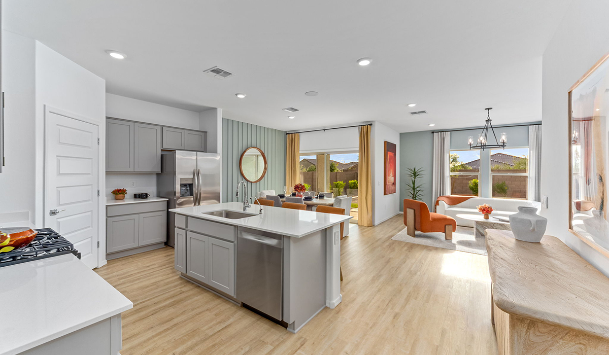 Step into The Cali at Hanson Ridge in Vail, Arizona - a thoughtfully crafted 1,823 sq. ft. single-story new home designed to offer a perfect harmony of comfort and desert elegance. As you enter through the inviting front porch, you're welcomed into a bright and airy living space that flows seamlessly into the great room, dining area, and kitchen. This open-concept design is perfect for both casual family living and entertaining. The kitchen, with its Quartz countertops, modern appliances, and a convenient pantry, is both stylish and functional, making meal preparation a breeze. The primary suite, located at the rear of the home, provides a private retreat with a spacious bedroom, a large walk-in closet, and an en-suite bathroom featuring dual vanities and a walk-in shower.  Whether you’re planning to create a dream outdoor oasis or simply enjoy the natural surroundings, this space offers endless possibilities. Built with modern living in mind, The Cali includes D.R. Horton’s Home is Connected® Smart Home package, featuring a smart thermostat, video doorbell, keyless entry, and a Wi-Fi enabled garage door opener. Energy efficiency is also a priority, with spray foam insulation and designs that meet the DOE Zero Energy Ready Home standards, ensuring long-term savings and environmental benefits.  Located within the serene Hanson Ridge community, residents of The Cali enjoy the luxury of space combined with easy access to urban amenities. Come home to The Cali, where comfort, style, and the beauty of Arizona living come together in perfect harmony.  *Images shown are for reference only. They depict a model home and may not represent the actual home.