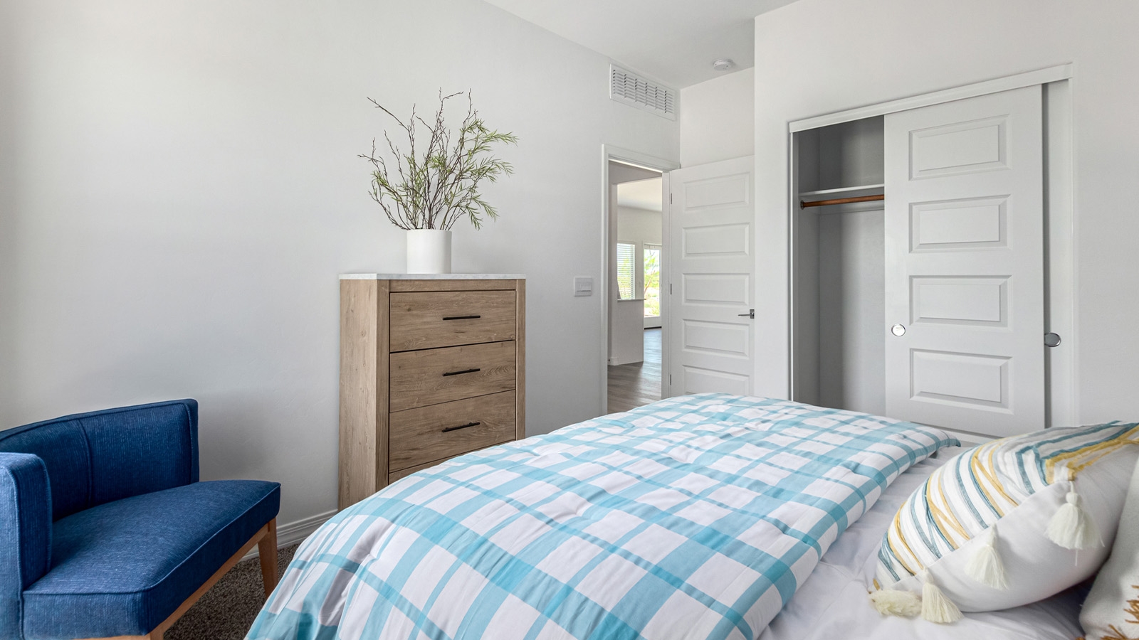 Step into The Cali at Hanson Ridge in Vail, Arizona - a thoughtfully crafted 1,823 sq. ft. single-story new home designed to offer a perfect harmony of comfort and desert elegance. As you enter through the inviting front porch, you're welcomed into a bright and airy living space that flows seamlessly into the great room, dining area, and kitchen. This open-concept design is perfect for both casual family living and entertaining. The kitchen, with its Quartz countertops, modern appliances, and a convenient pantry, is both stylish and functional, making meal preparation a breeze. The primary suite, located at the rear of the home, provides a private retreat with a spacious bedroom, a large walk-in closet, and an en-suite bathroom featuring dual vanities and a walk-in shower.  Whether you’re planning to create a dream outdoor oasis or simply enjoy the natural surroundings, this space offers endless possibilities. Built with modern living in mind, The Cali includes D.R. Horton’s Home is Connected® Smart Home package, featuring a smart thermostat, video doorbell, keyless entry, and a Wi-Fi enabled garage door opener. Energy efficiency is also a priority, with spray foam insulation and designs that meet the DOE Zero Energy Ready Home standards, ensuring long-term savings and environmental benefits.  Located within the serene Hanson Ridge community, residents of The Cali enjoy the luxury of space combined with easy access to urban amenities. Come home to The Cali, where comfort, style, and the beauty of Arizona living come together in perfect harmony.  *Images shown are for reference only. They depict the sales model home and may not represent the actual home.