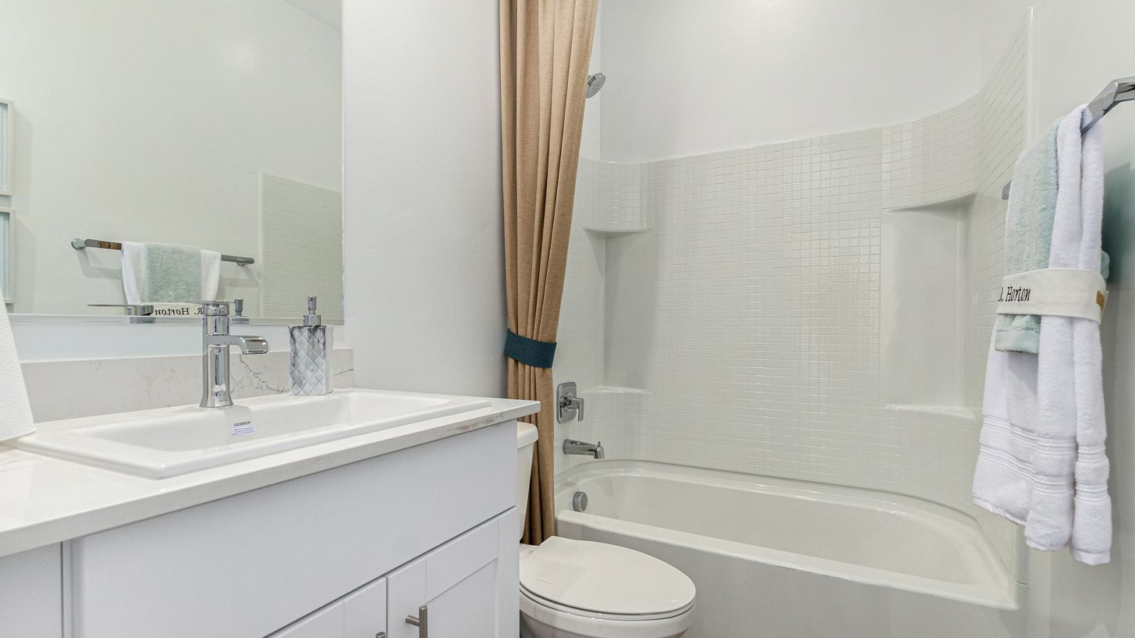 Step into The Cali at Hanson Ridge in Vail, Arizona - a thoughtfully crafted 1,823 sq. ft. single-story new home designed to offer a perfect harmony of comfort and desert elegance. As you enter through the inviting front porch, you're welcomed into a bright and airy living space that flows seamlessly into the great room, dining area, and kitchen. This open-concept design is perfect for both casual family living and entertaining. The kitchen, with its Quartz countertops, modern appliances, and a convenient pantry, is both stylish and functional, making meal preparation a breeze. The primary suite, located at the rear of the home, provides a private retreat with a spacious bedroom, a large walk-in closet, and an en-suite bathroom featuring dual vanities and a walk-in shower.  Whether you’re planning to create a dream outdoor oasis or simply enjoy the natural surroundings, this space offers endless possibilities. Built with modern living in mind, The Cali includes D.R. Horton’s Home is Connected® Smart Home package, featuring a smart thermostat, video doorbell, keyless entry, and a Wi-Fi enabled garage door opener. Energy efficiency is also a priority, with spray foam insulation and designs that meet the DOE Zero Energy Ready Home standards, ensuring long-term savings and environmental benefits.  Located within the serene Hanson Ridge community, residents of The Cali enjoy the luxury of space combined with easy access to urban amenities. Come home to The Cali, where comfort, style, and the beauty of Arizona living come together in perfect harmony.  *Images shown are for reference only. They depict the sales model home and may not represent the actual home.