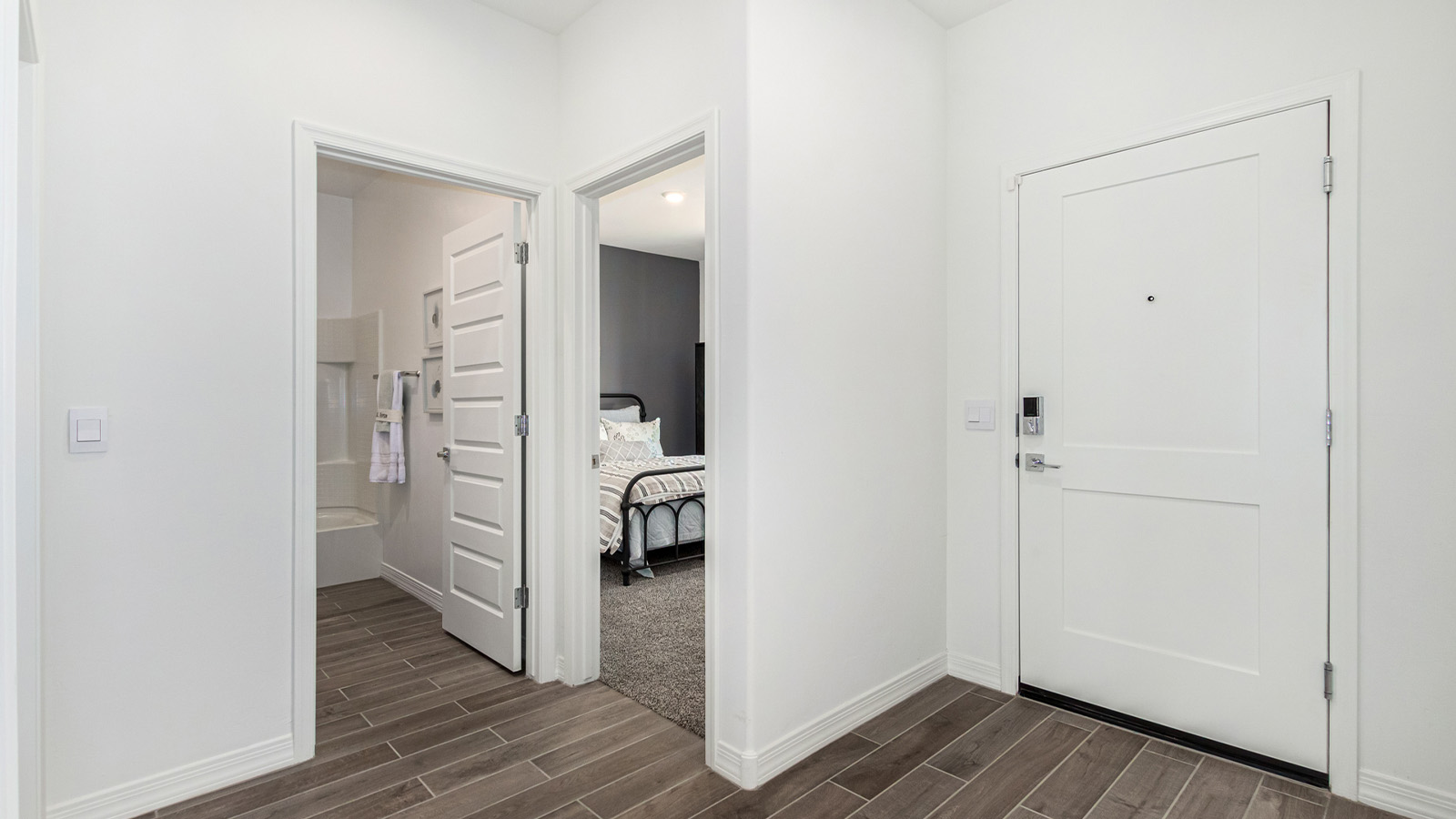 Step into The Cali at Hanson Ridge in Vail, Arizona - a thoughtfully crafted 1,823 sq. ft. single-story new home designed to offer a perfect harmony of comfort and desert elegance. As you enter through the inviting front porch, you're welcomed into a bright and airy living space that flows seamlessly into the great room, dining area, and kitchen. This open-concept design is perfect for both casual family living and entertaining. The kitchen, with its Quartz countertops, modern appliances, and a convenient pantry, is both stylish and functional, making meal preparation a breeze. The primary suite, located at the rear of the home, provides a private retreat with a spacious bedroom, a large walk-in closet, and an en-suite bathroom featuring dual vanities and a walk-in shower.  Whether you’re planning to create a dream outdoor oasis or simply enjoy the natural surroundings, this space offers endless possibilities. Built with modern living in mind, The Cali includes D.R. Horton’s Home is Connected® Smart Home package, featuring a smart thermostat, video doorbell, keyless entry, and a Wi-Fi enabled garage door opener. Energy efficiency is also a priority, with spray foam insulation and designs that meet the DOE Zero Energy Ready Home standards, ensuring long-term savings and environmental benefits.  Located within the serene Hanson Ridge community, residents of The Cali enjoy the luxury of space combined with easy access to urban amenities. Come home to The Cali, where comfort, style, and the beauty of Arizona living come together in perfect harmony.  *Images shown are for reference only. They depict the sales model home and may not represent the actual home.