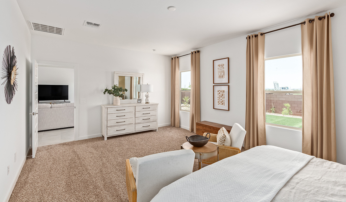 Step into The Kingston at Hanson Ridge in Vail Arizona – a perfect blend of comfort, modern living, and energy efficiency. This thoughtfully crafted single-story home spans 2,053 square feet and has four bedrooms and two bathrooms. This newly designed model offers harmony of comfort and desert elegance.  The open-concept design features a spacious great room that effortlessly connects with the kitchen and dining area, creating an inviting central hub for everyday living and entertaining. The kitchen is equipped with contemporary appliances and a pantry, offering ample storage and convenience for meal preparation and large center island. The primary bedroom, located at the rear of the home, provides a peaceful retreat with a private ensuite bathroom and a generous walk-in closet. The additional three bedrooms are positioned at the front of the house, offering versatility for use as guest rooms, a home office, or children’s bedrooms. Step outside to the covered patio, a perfect spot to enjoy the beautiful Arizona weather, whether for morning coffee or evening relaxation.  Built with energy efficiency as a priority, The Kingston includes smart home technology, which not only simplifies daily living but also helps reduce utility costs. A two-car garage provides ample parking and additional storage space, enhancing the home’s functionality. The Kingston at Hanson Ridge meets DOE Zero Energy Ready Home standards, ensuring sustainability and long-term savings.  Living at Hanson Ridge means more than just having a beautiful home. The community offers a peaceful lifestyle with incredible desert landscapes, mountain views, and easy access to I-10 for convenient commutes to Tucson and surrounding areas. Experience the charm and comfort of The Kingston at Hanson Ridge, where modern convenience meets the beauty of Arizona’s desert landscape.  *Images shown are for reference only. They depict the sales model home and may not represent the actual home.